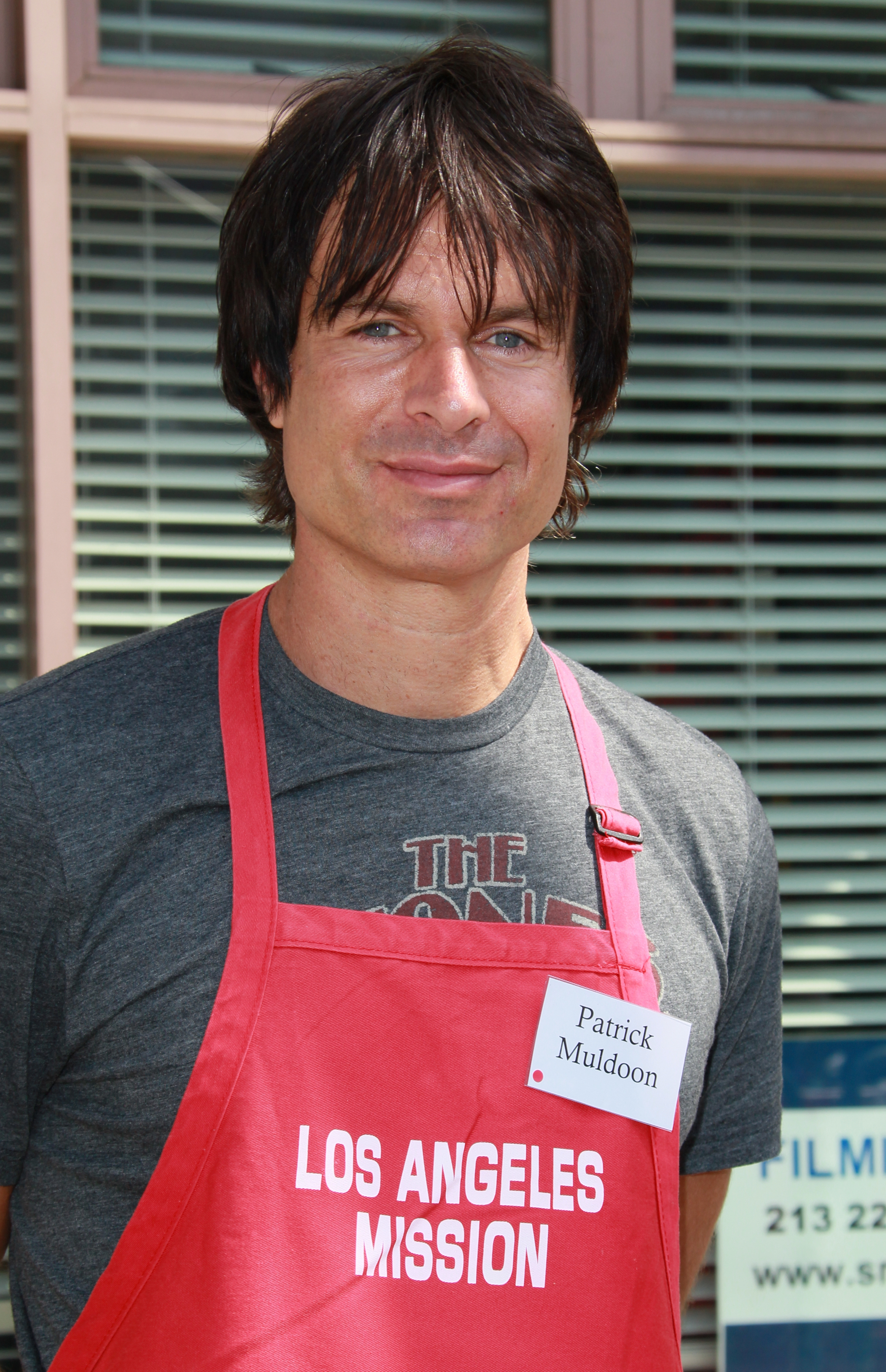 Actor Patrick Muldoon volunteers at the Los Angeles Mission during Easter on April 2, 2010 in Los Angeles, California