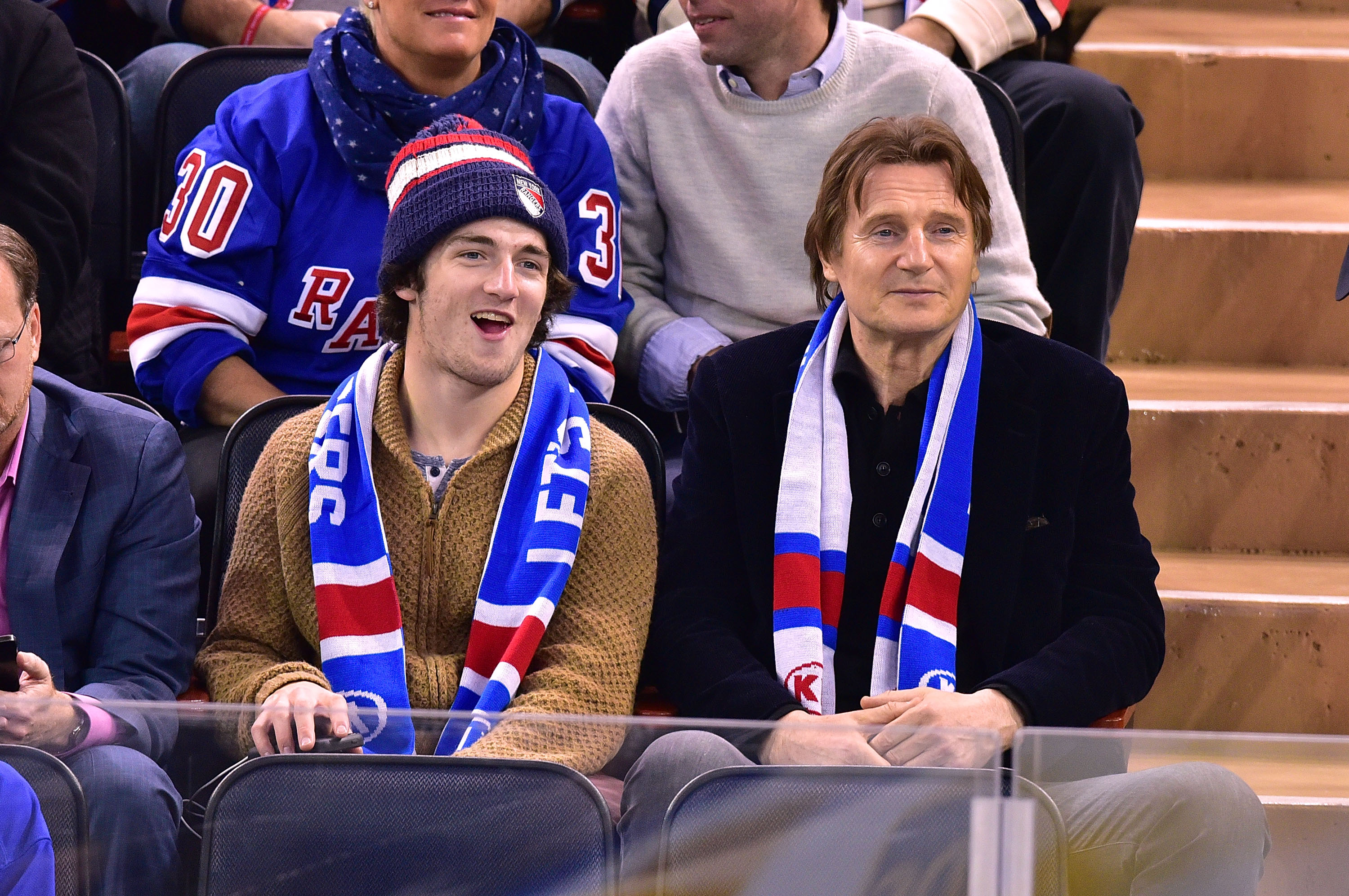Daniel Neeson and Liam Neeson attend Ottawa Senators vs New York Rangers game at Madison Square Garden on January 20, 2015, in New York City | Source: Getty Images