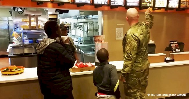 Heartwarming moment a soldier feeds two hungry little boys and his good deed goes viral