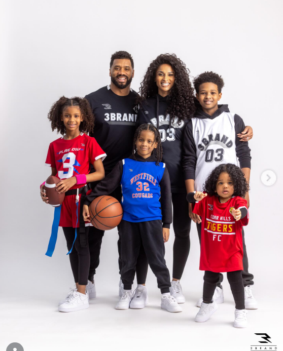 Ciara, Russell Wilson and their children pose in sports clothes on March 23, 2026 | Source: Instagram/dangerusswilson