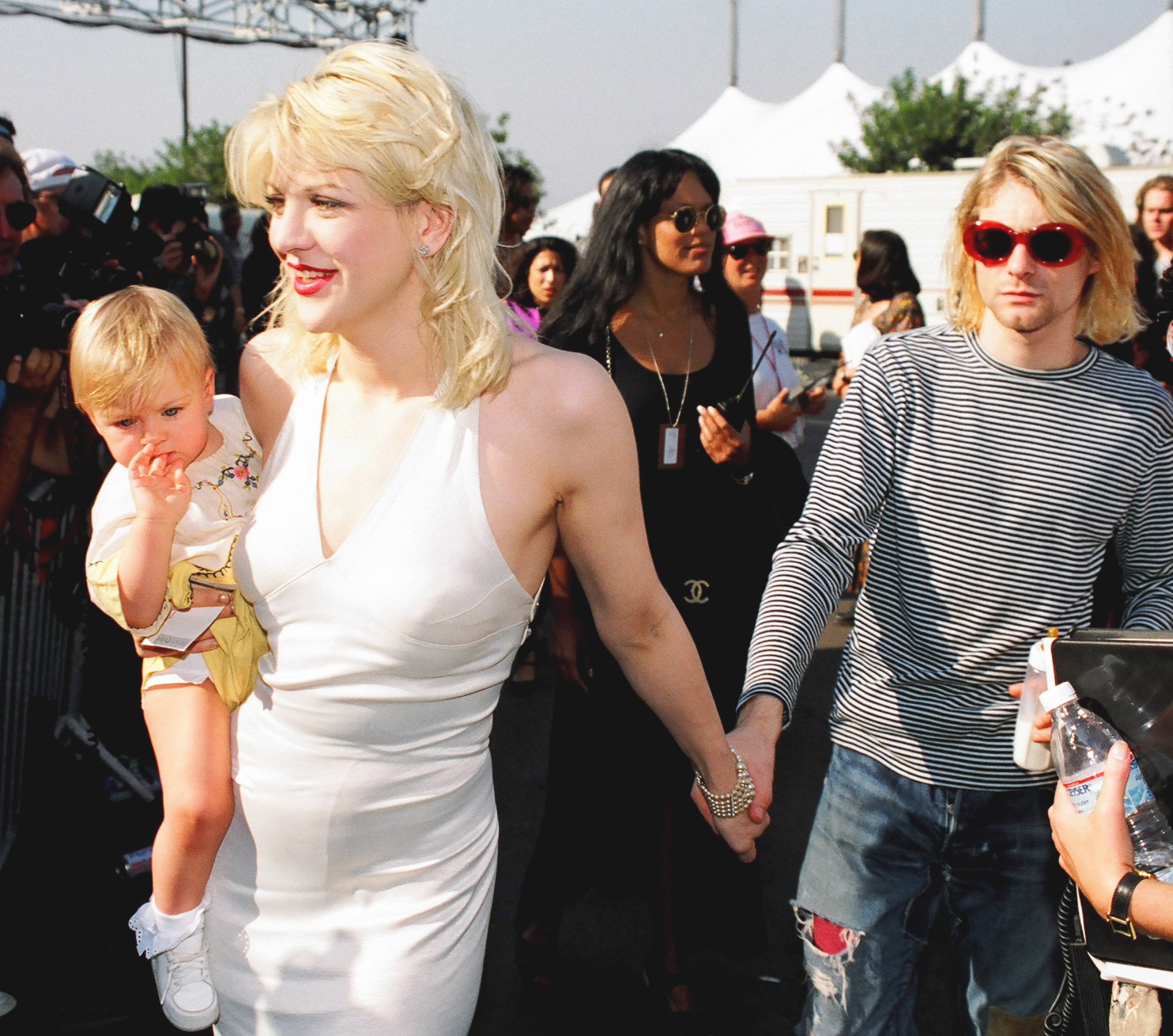 Courtney Love, Frances Bean Cobain, and Kurt Cobain at the 1993 MTV Video Music Awards on September 2, 1993 | Source: Getty Images