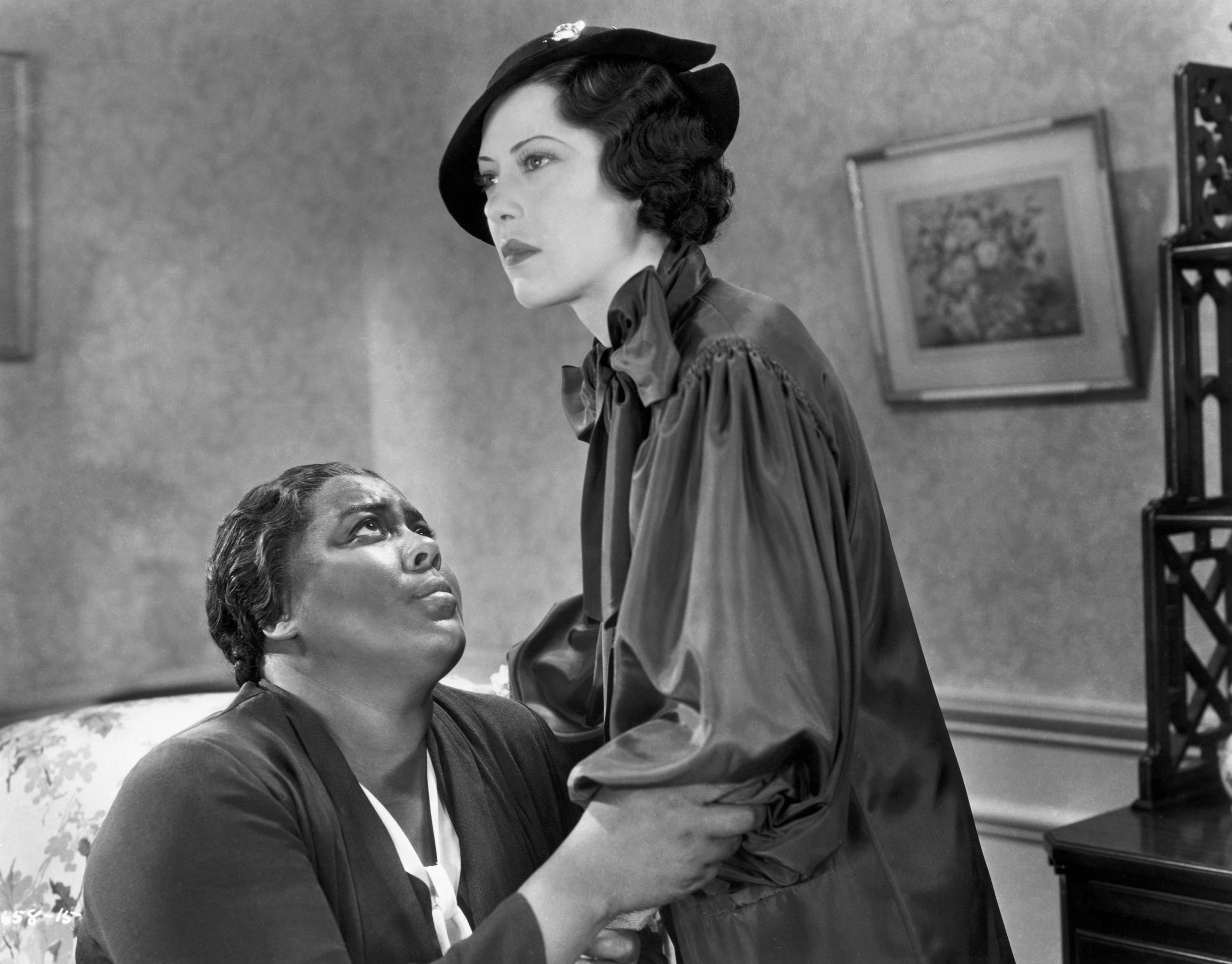 Fredi Washington and Louise Beavers in "Imitation of Life" | Source: Getty Images