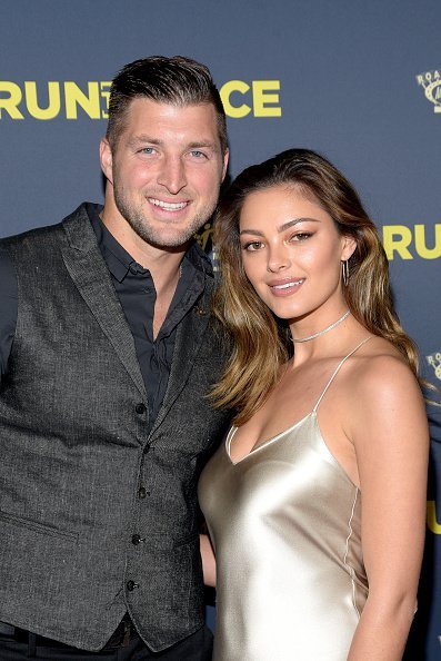 Tim Tebow and Demi-Leigh Nel-Peters attend the premiere of Roadside Attractions' "Run The Race" at the Egyptian Theatre on February 11, 2019 in Hollywood, California | Photo: Getty Images