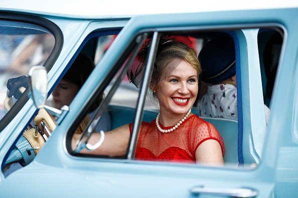 A woman in a vintage car  | Image: Getty Images