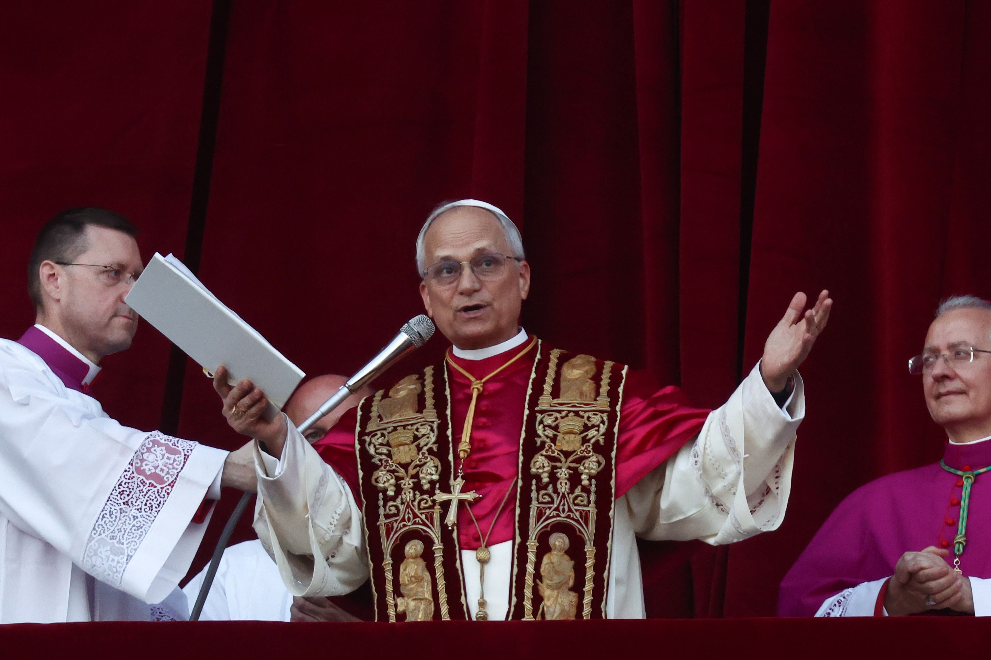 Cardinal Robert Prevost, newly elected as Pope Leo XIV, delivers his first public address from the balcony of Saint Peter's Basilica on May 8, 2025 | Source: Getty Images