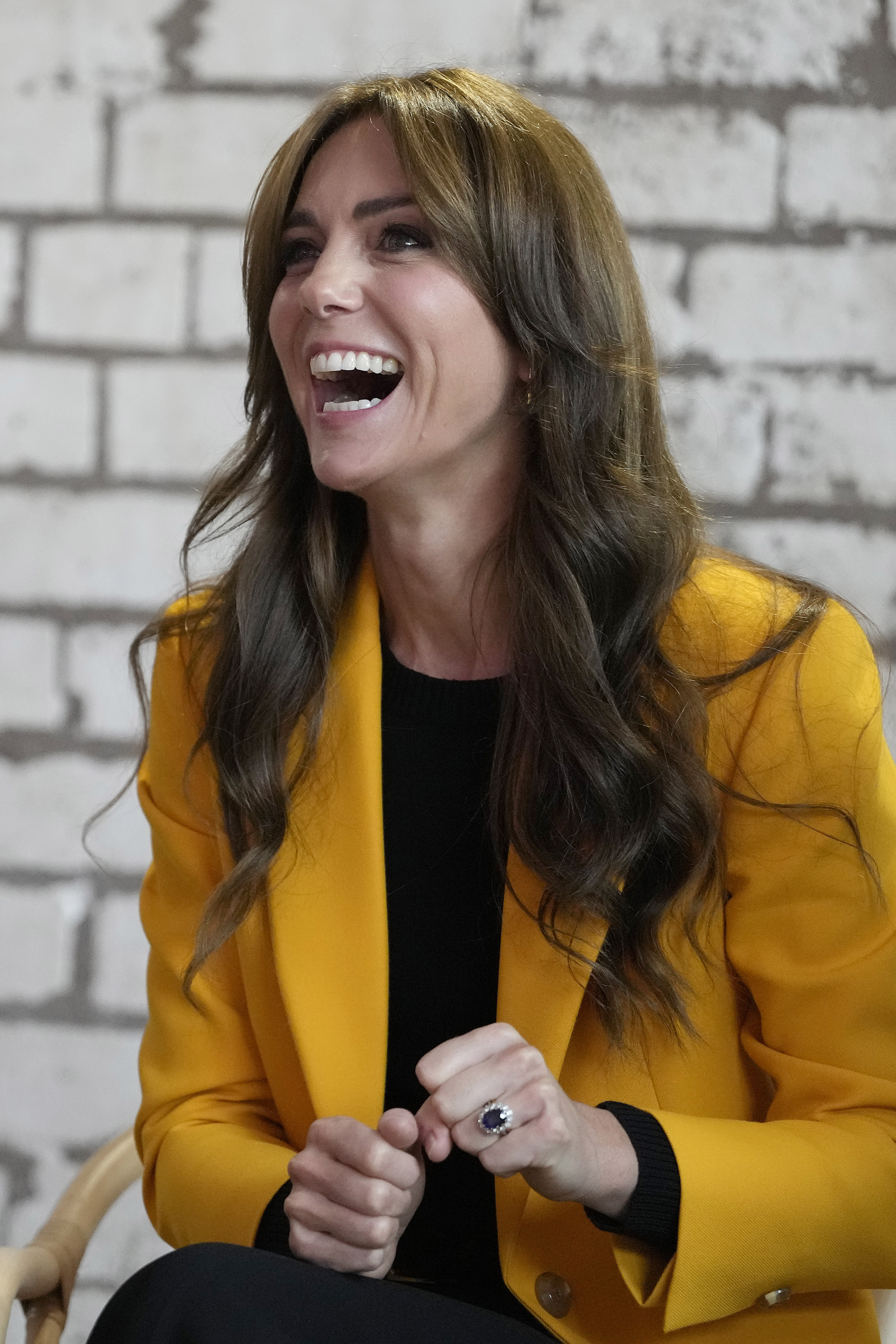 Catherine, Princess of Wales reacts as she participates in a series of workshops that focus on emotions, relationships, and community action in Birmingham, England, on October 10, 2023 | Source: Getty Images