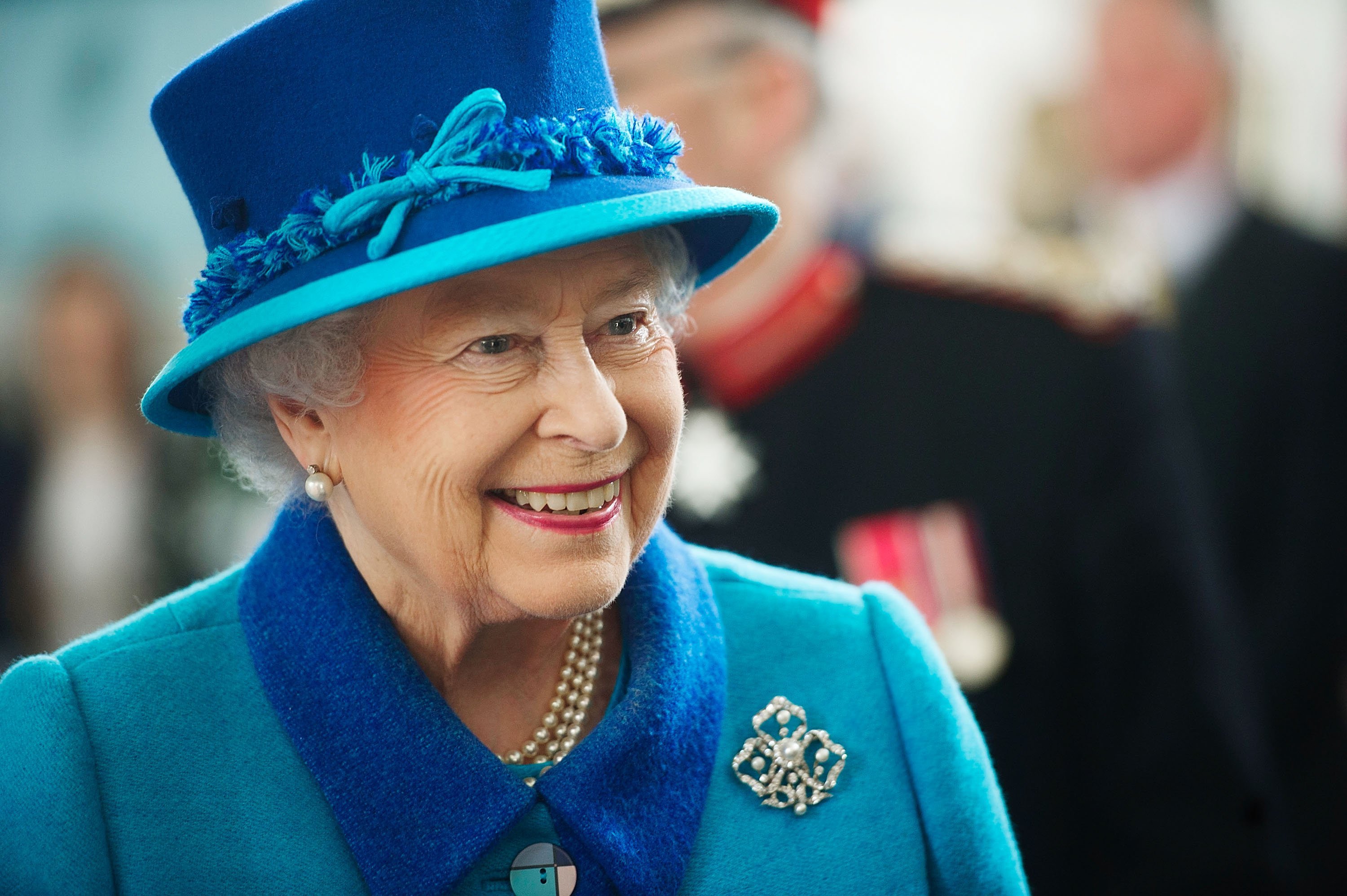 Queen Elizabeth II during a visit to the Chapel to view the restoration and meet local people involved with the project at the Royal Dockyard Chapel on April 29, 2014, in Pembroke Dock, United Kingdom. | Source: Getty Images.