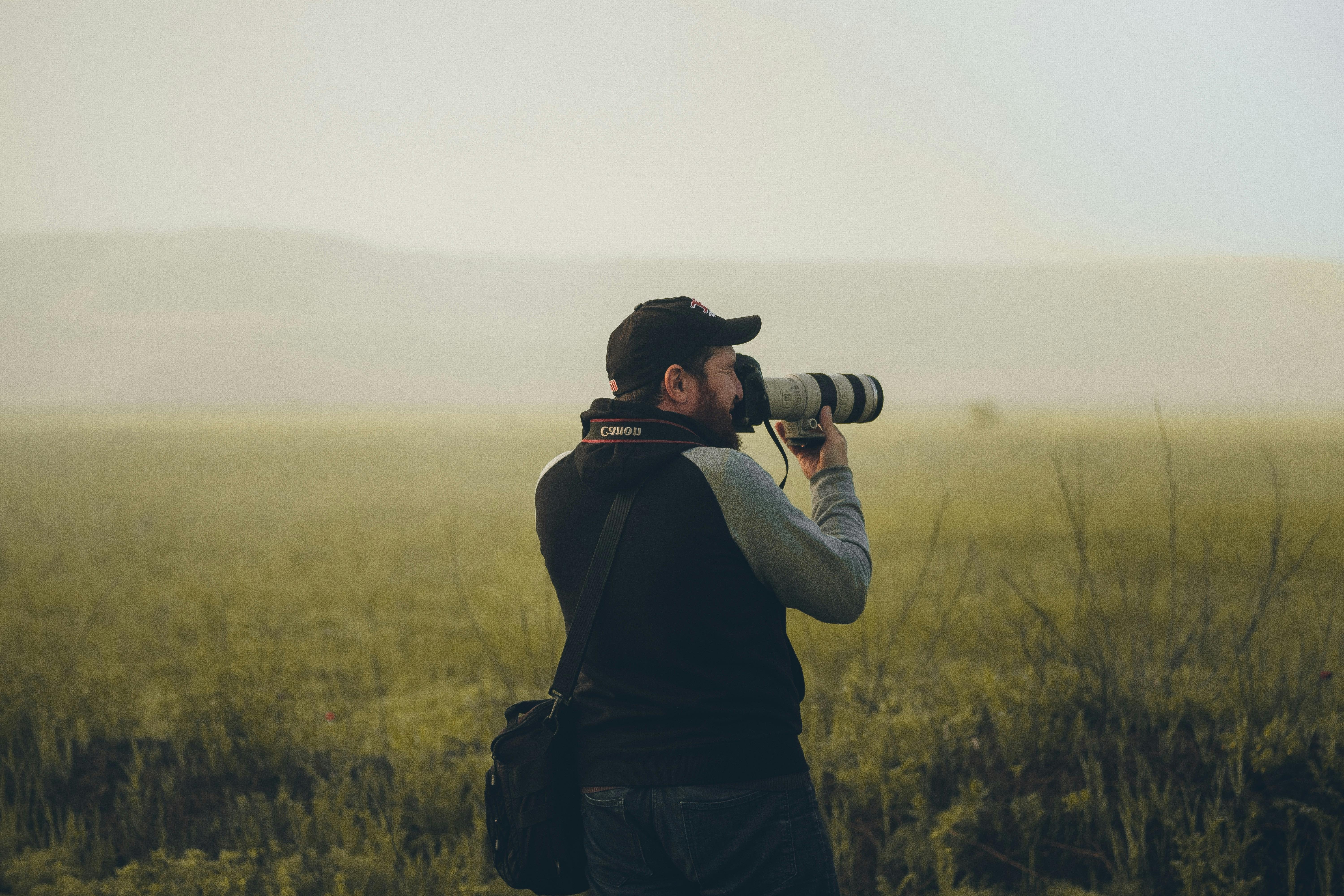 A man taking photos on his camera | Source: Pexels
