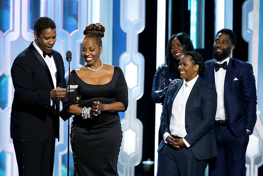 Denzel Washington accepting the Cecil B. Demille Award with his family at the 73rd Annual Golden Globe Awards in January 2016. | Photo: Getty Images 