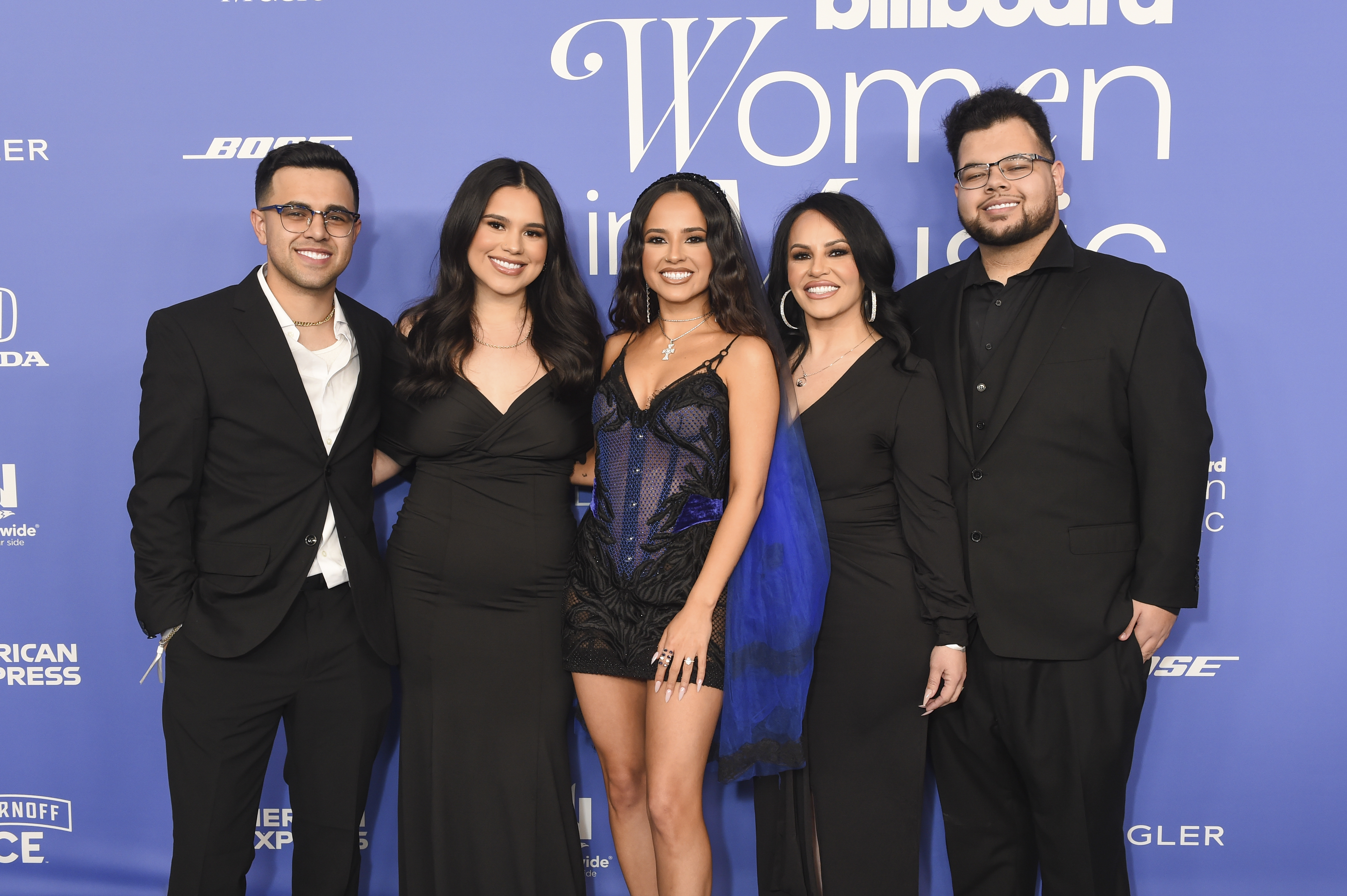 Becky G, Alex Gomez, and their family during the Billboard Women In Music event at YouTube Theater on March 1, 2023, in Los Angeles, California. | Source: Getty Images