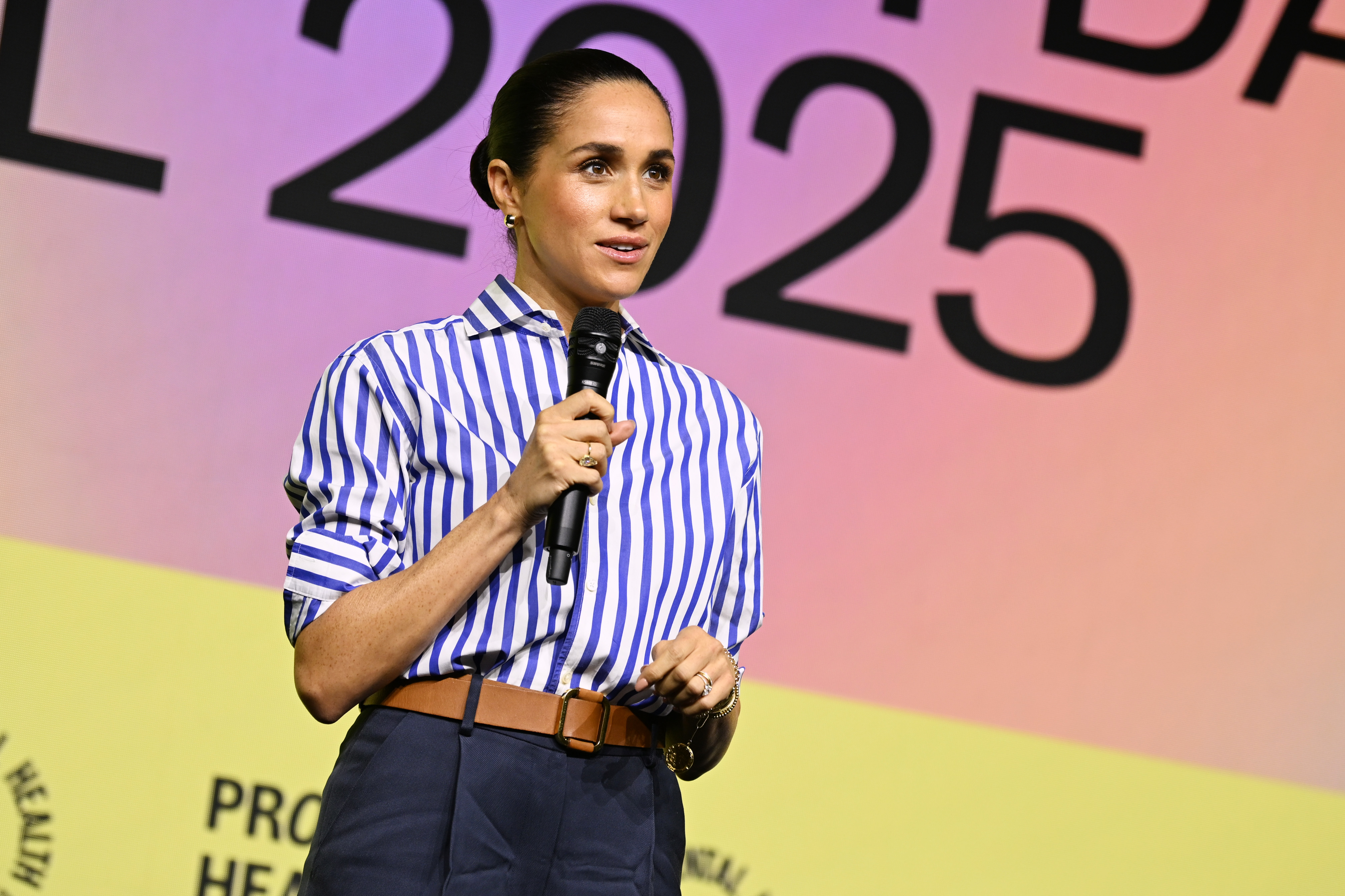Meghan Markle speaking on stage at the event in New York. | Source: Getty Images