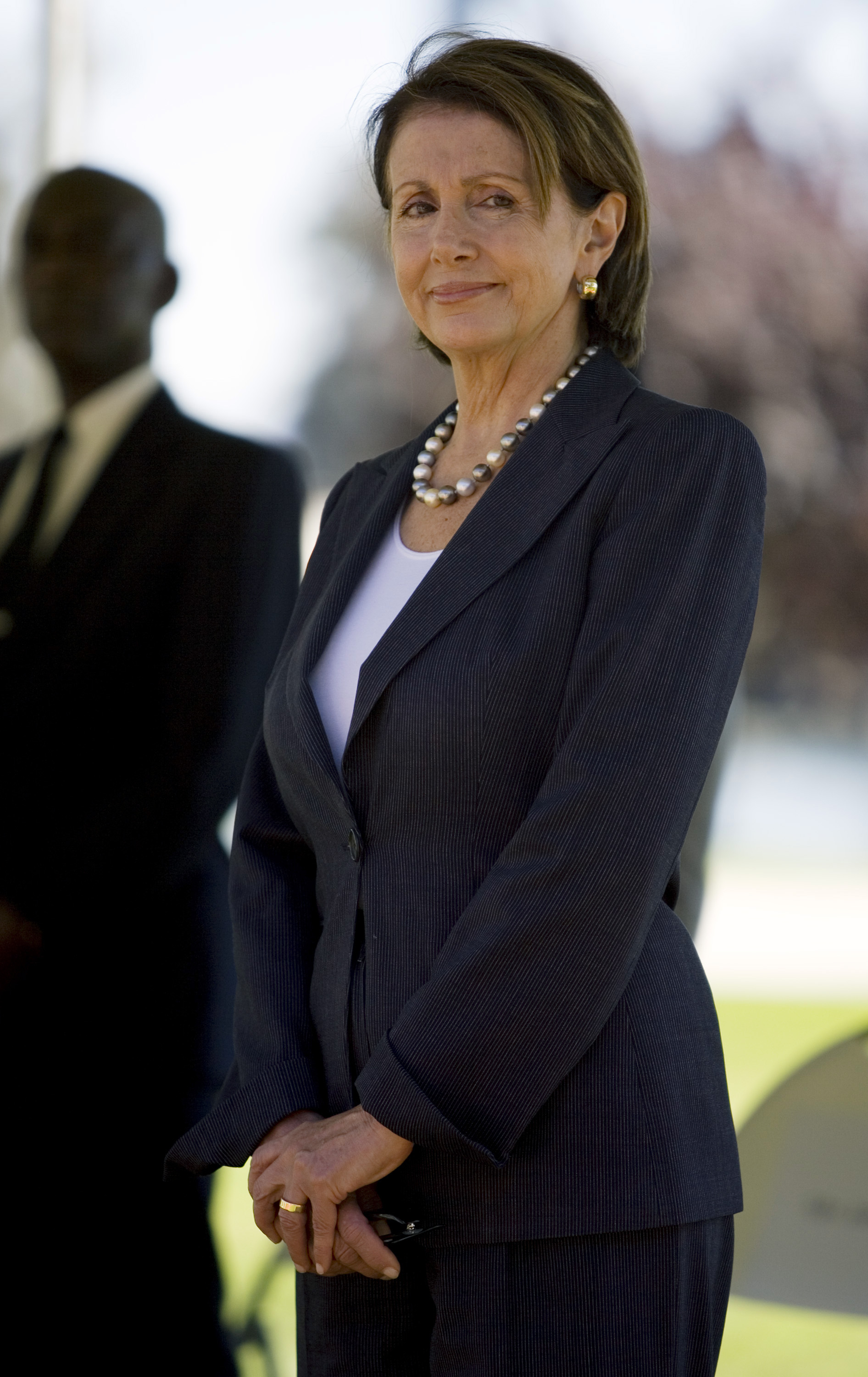 Nancy Pelosi listens during a ceremony held by the U.S. Coast Guard on their Yerba Buena island base, on August 16, 2007, in San Francisco, California. | Source: Getty Images