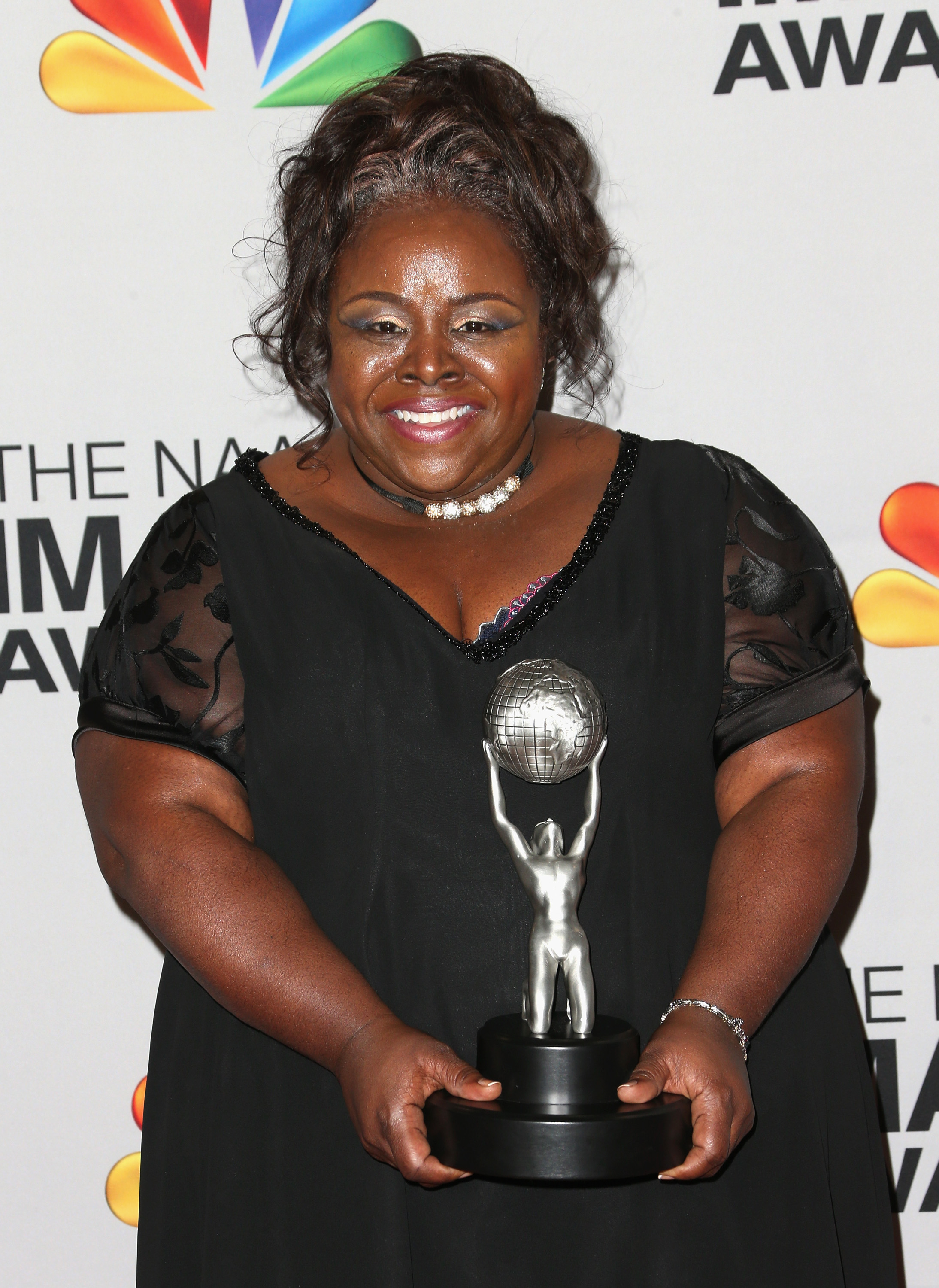 Cassi Davis poses with her award in the press room during the 44th NAACP Image Awards at The Shrine Auditorium on February 1, 2013, in Los Angeles, California. | Source: Getty Images