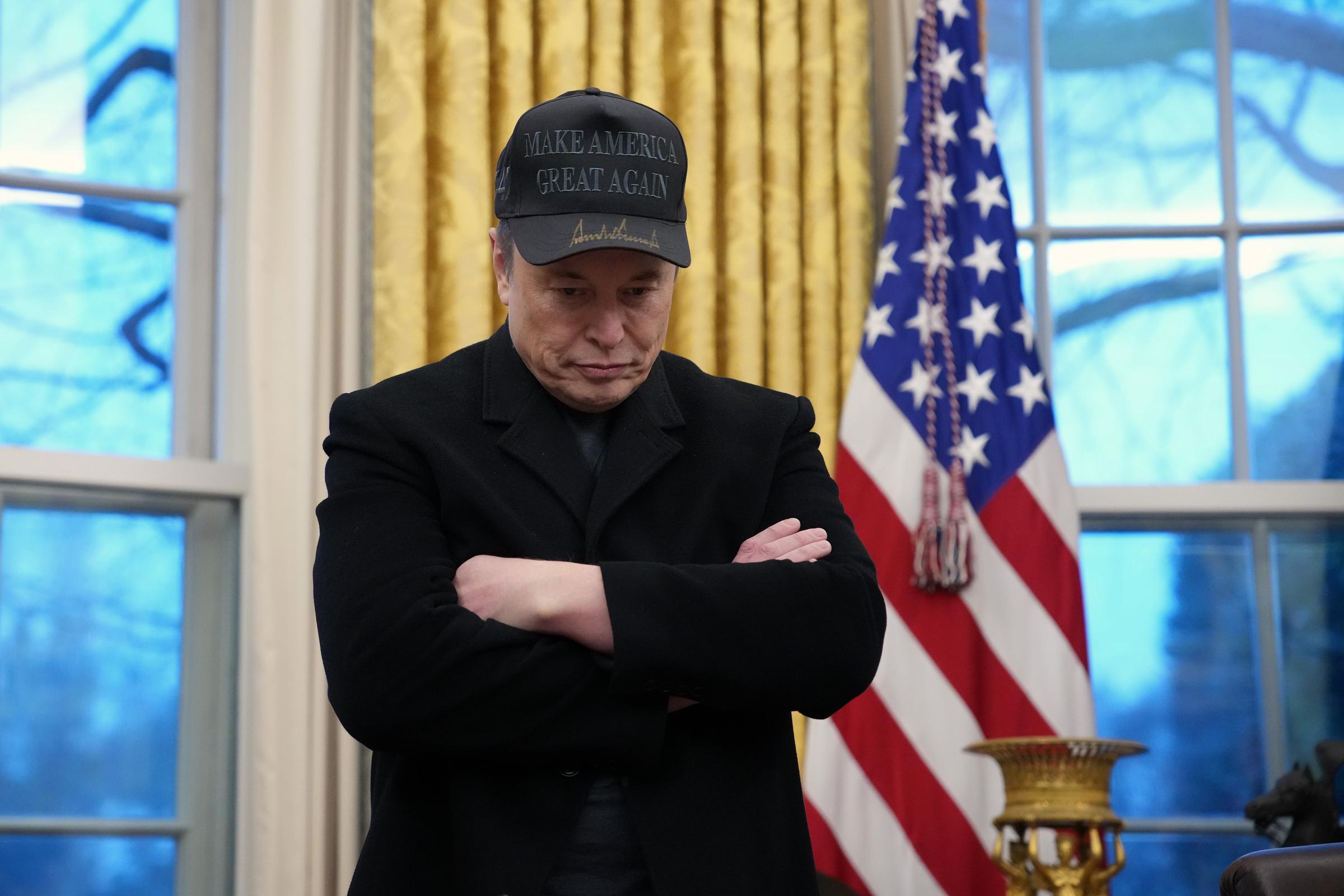 Elon Musk joins U.S. President Donald Trump during an executive order signing in the Oval Office at the White House in Washington, DC, on February 11, 2025 | Source: Getty Images