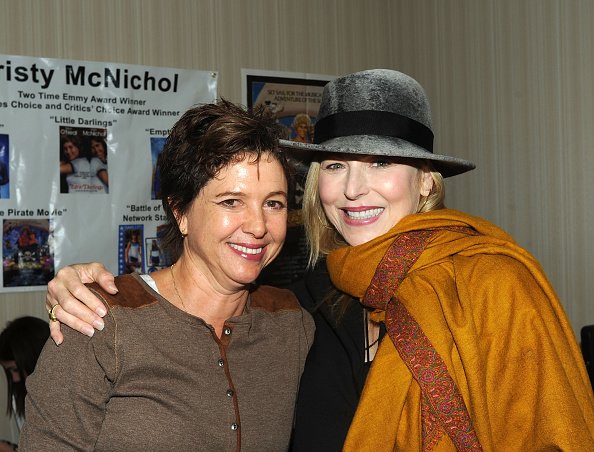 Kristy McNichol and Tatum O'Neal who starred in "Little Darlings" together reunite at Day 1 of the Chiller Theatre Expo at Sheraton Parsippany Hotel on October 24, 2014 in Parsippany, New Jersey. | Photo: Getty Images