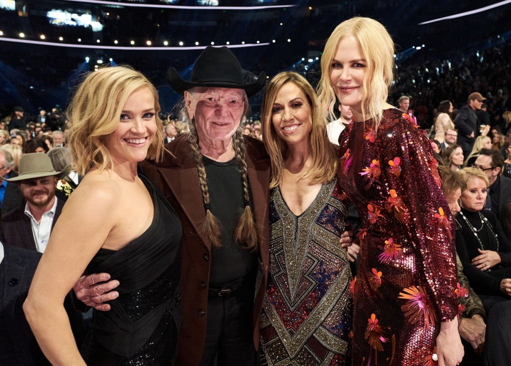 Reese Witherspoon, Willie Nelson, Sheryl Crow and Nicole Kidman attend the 53rd annual CMA Awards at the Bridgestone Arena on November 13, 2019 in Nashville, Tennessee. Image Credit: Getty Images