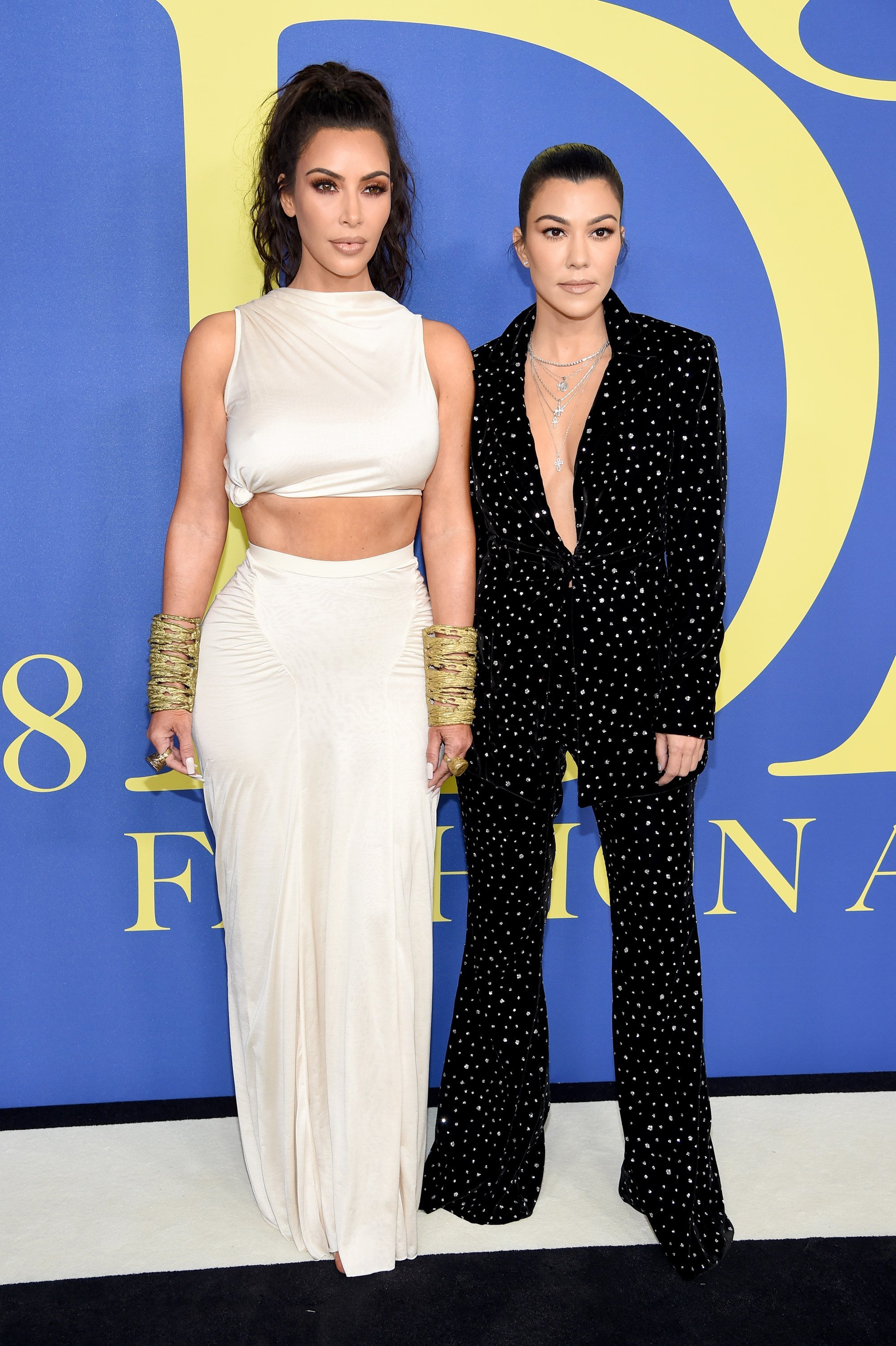 Kim Kardashian West and Kourtney Kardashian attend the 2018 CFDA Fashion Awards on June 4, 2018 in New York City. | Source: Getty Images.