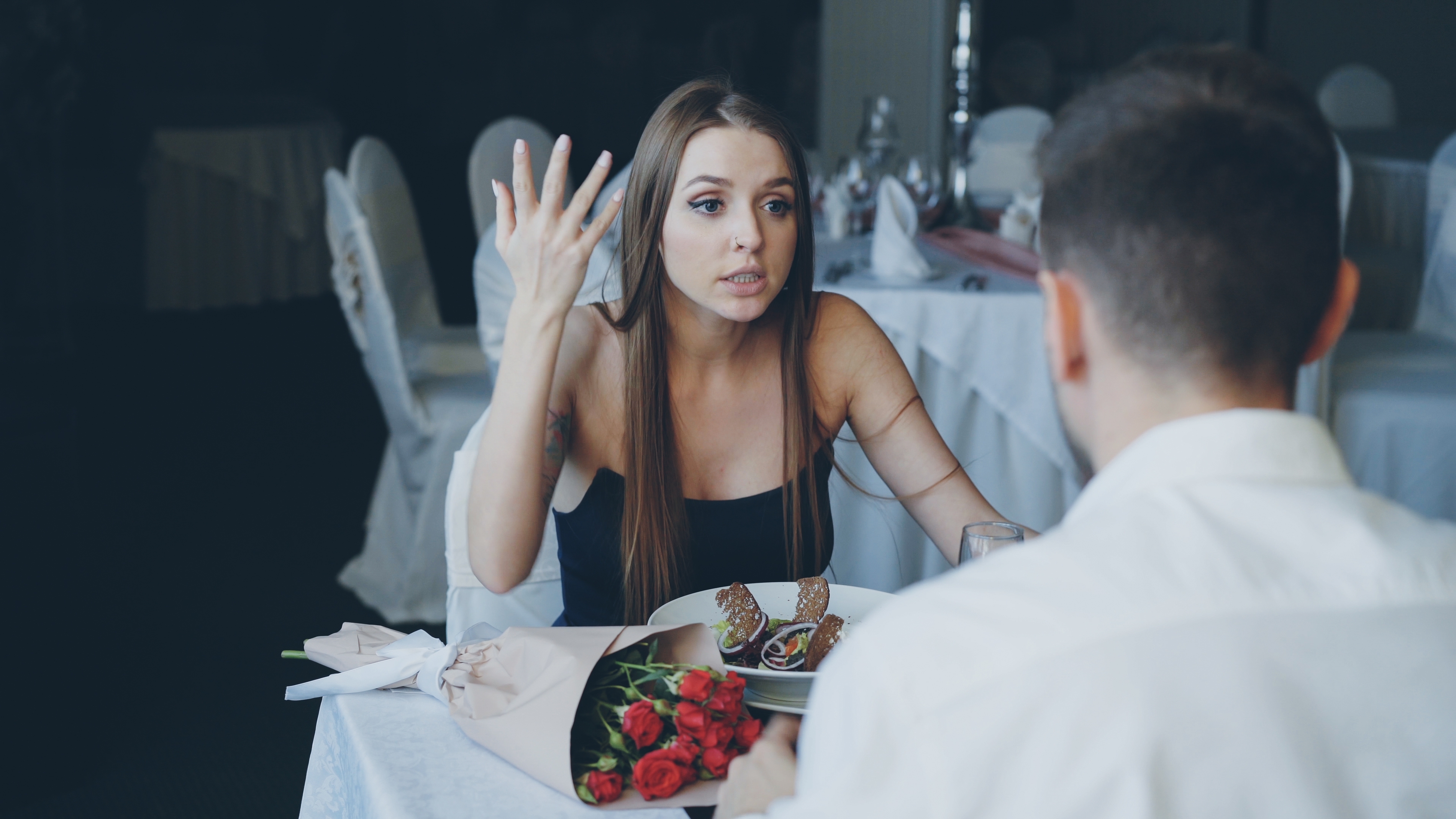 Woman arguing with his lover on a date | Source: Shutterstock