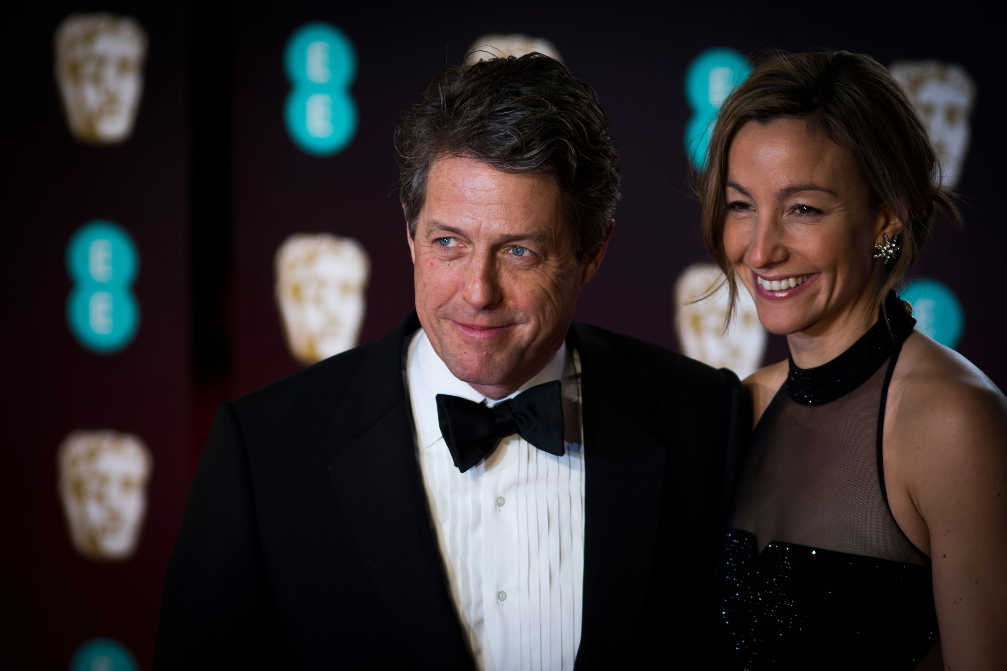 Hugh Grant and Anna Elisabet Eberstein at the 70th EE British Academy Film Awards in 2017, in London, England | Source: Getty Images
