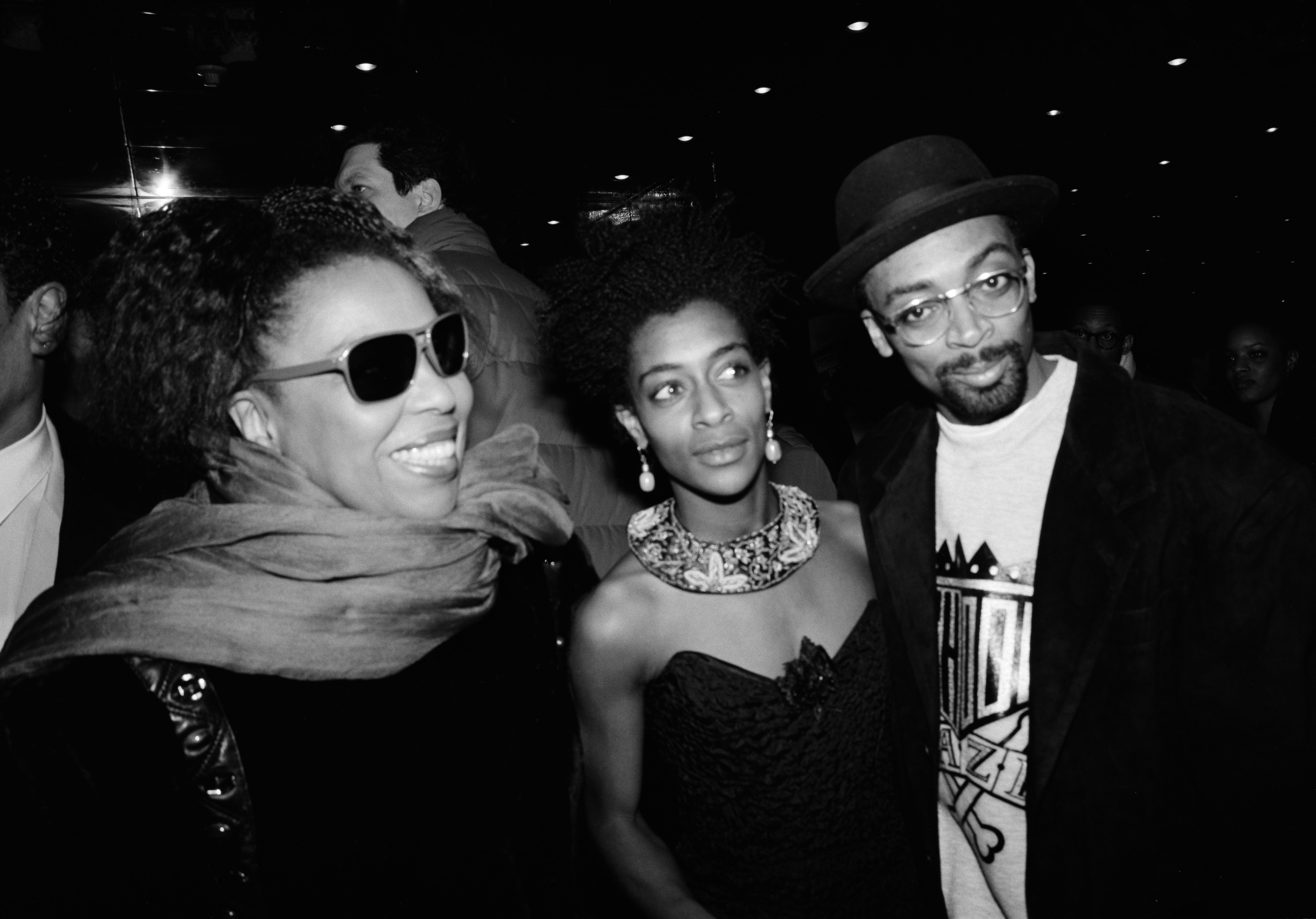 Singer Roberta Flack, actress Joie Lee, and film director Spike Lee, pose together at the Criterion Cinema during the preview of the film 'School Daze' on February 8, 1988, in New York City | Source: Getty Images