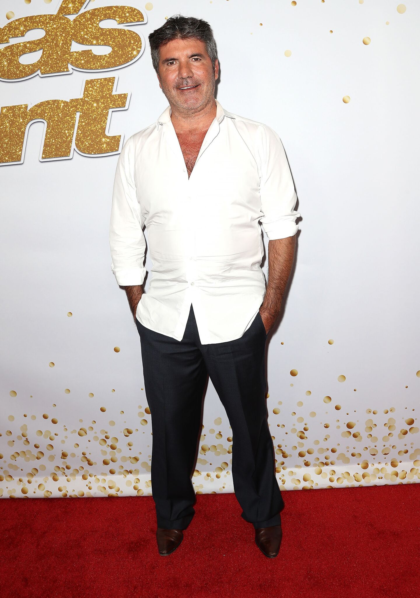 Simon Cowell attends the "America's Got Talent" Season 13 Live Show Red Carpet | Getty Images