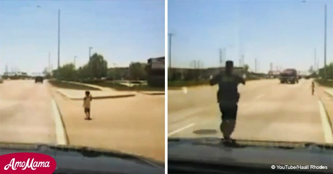 Officer rescues toddler running dangerously close to Highway (video)