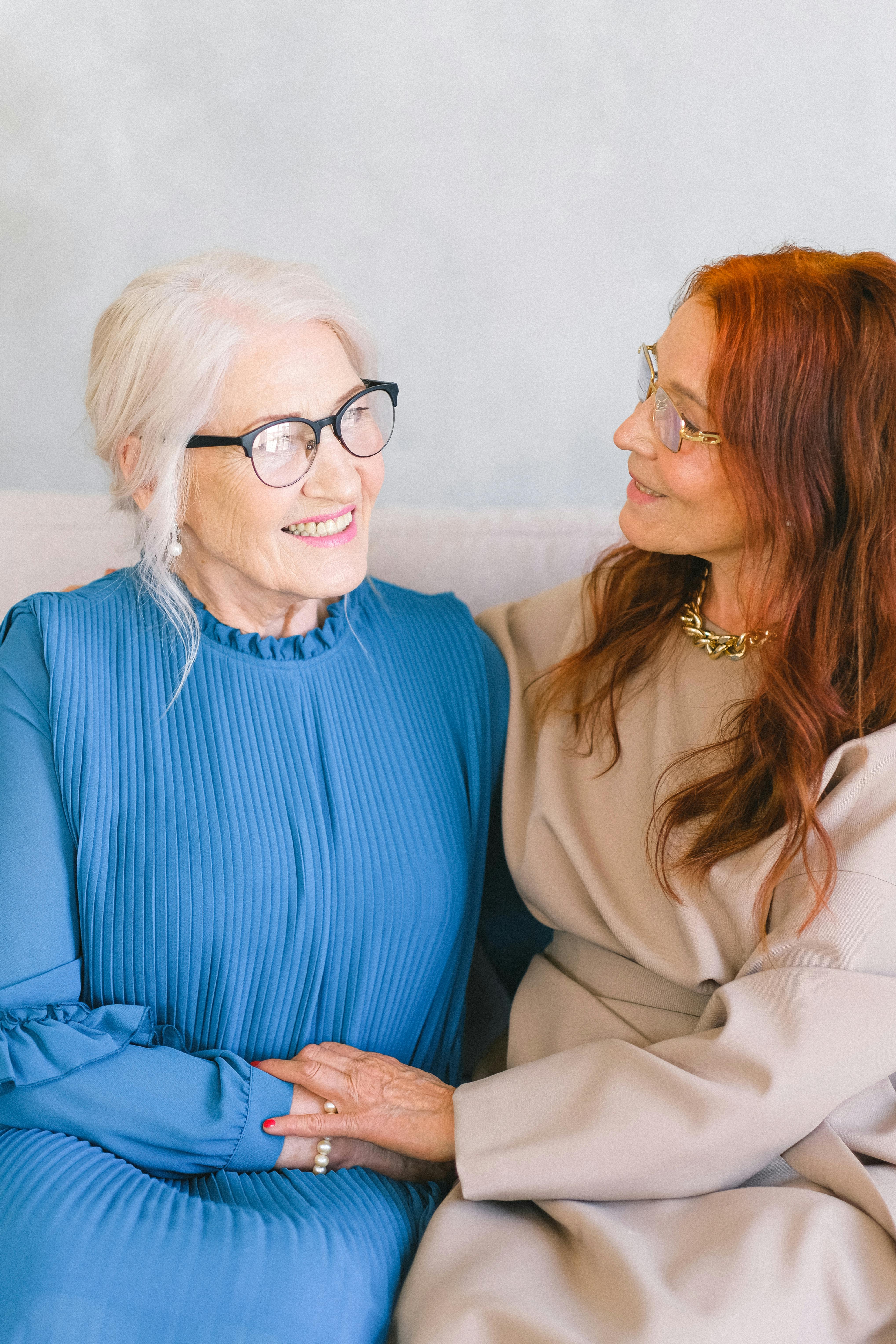 Two elderly women gossiping | Source: Pexels