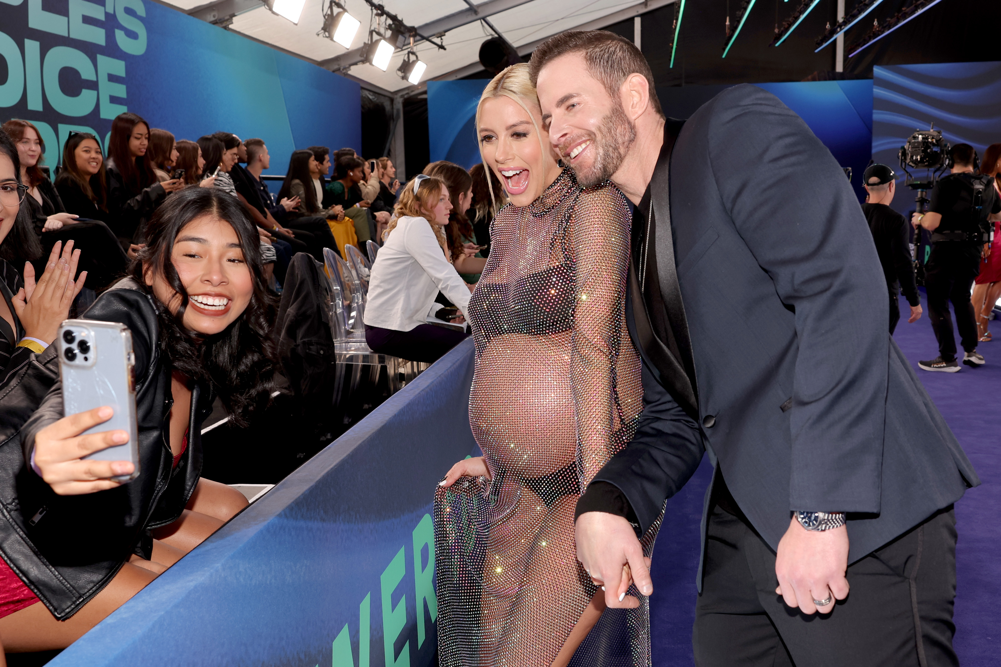 Heather Rae El Moussa and Tarek El Moussa arrive to the 2022 People's Choice Awards held at the Barker Hangar, on December 6, 2022, in Santa Monica, California. | Source: Getty Images