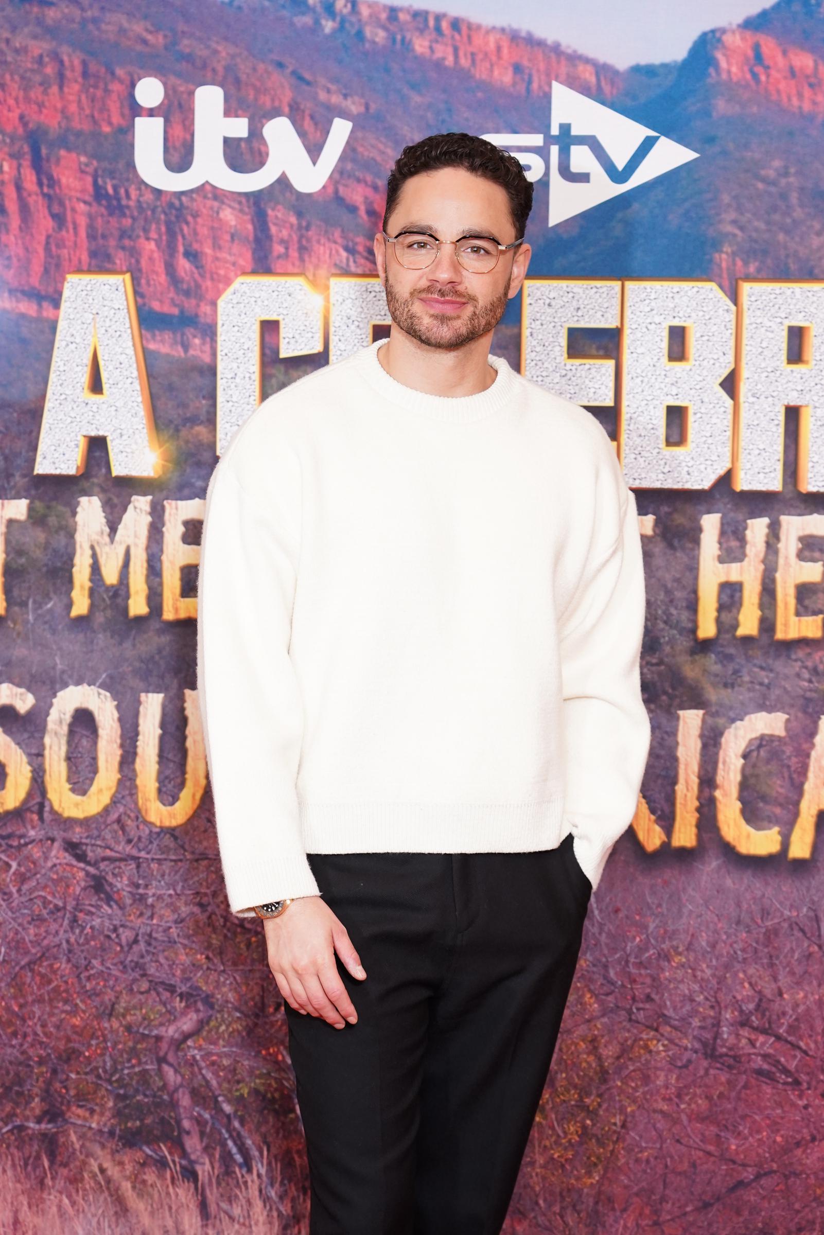 Adam Thomas during a photocall for the launch of season two of "I'm A Celebrity... Get Me Out Of Here! South Africa" on 9 March 2026 in London, England. | Source: Getty Images