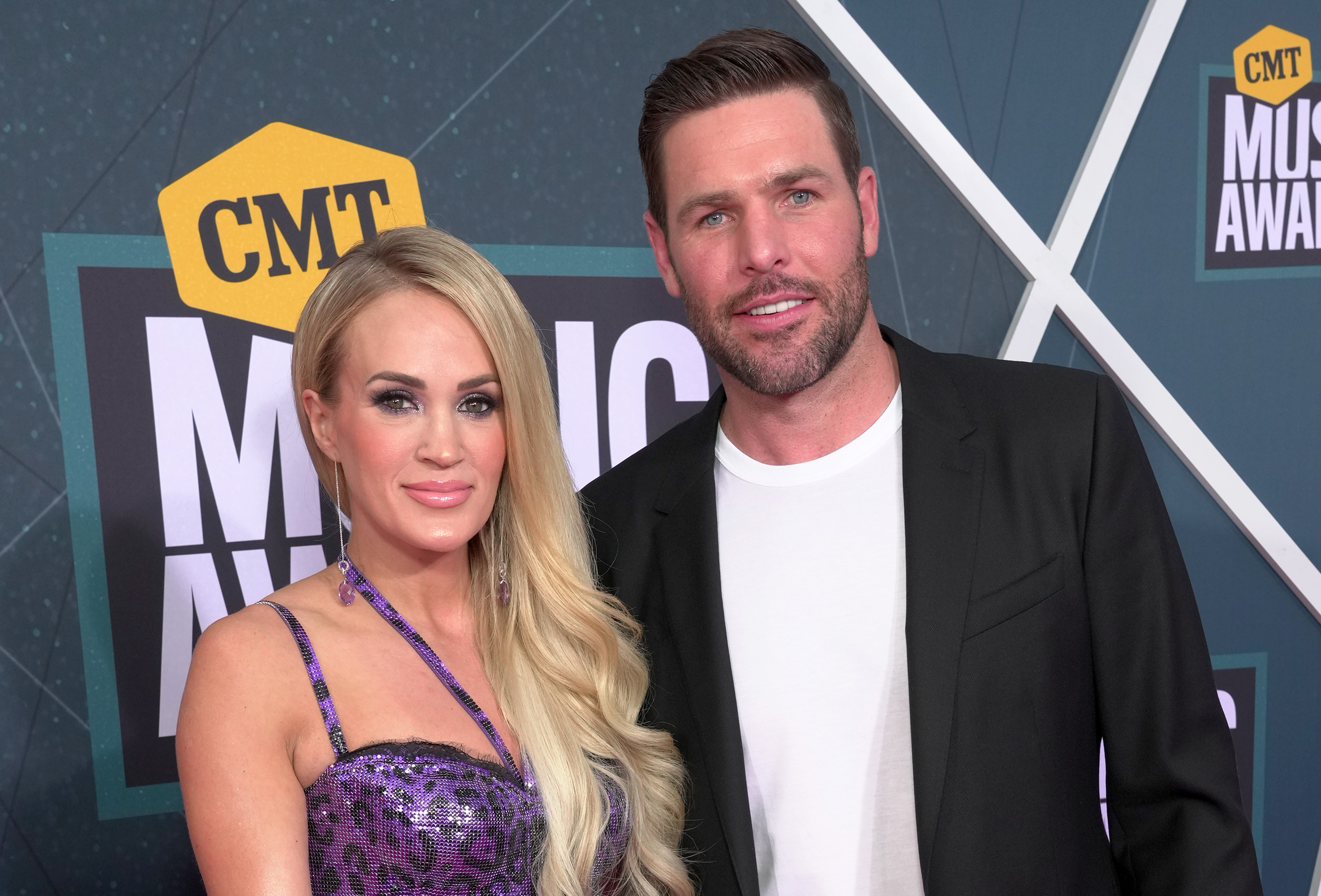 Carrie Underwood and Mike Fisher attend the CMT Music Awards on April 11, 2022, in Nashville, Tennessee. | Source: Getty Images