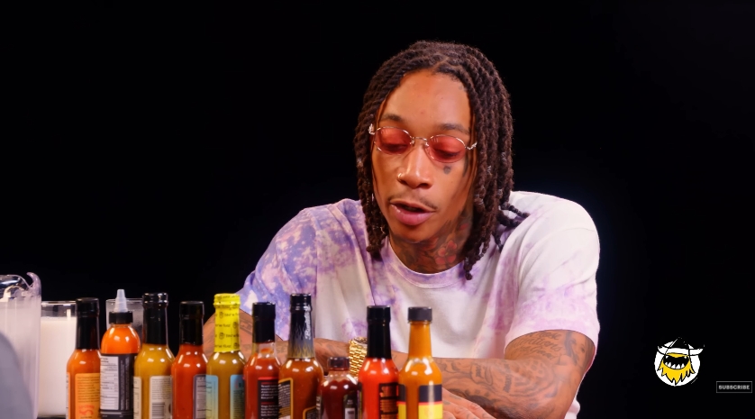 Wiz Khalifa shares his recommendations for Pittsburgh landmarks, restaurants, and local favorites during an appearance on "Hot Ones." | Source: YouTube/First We Feast