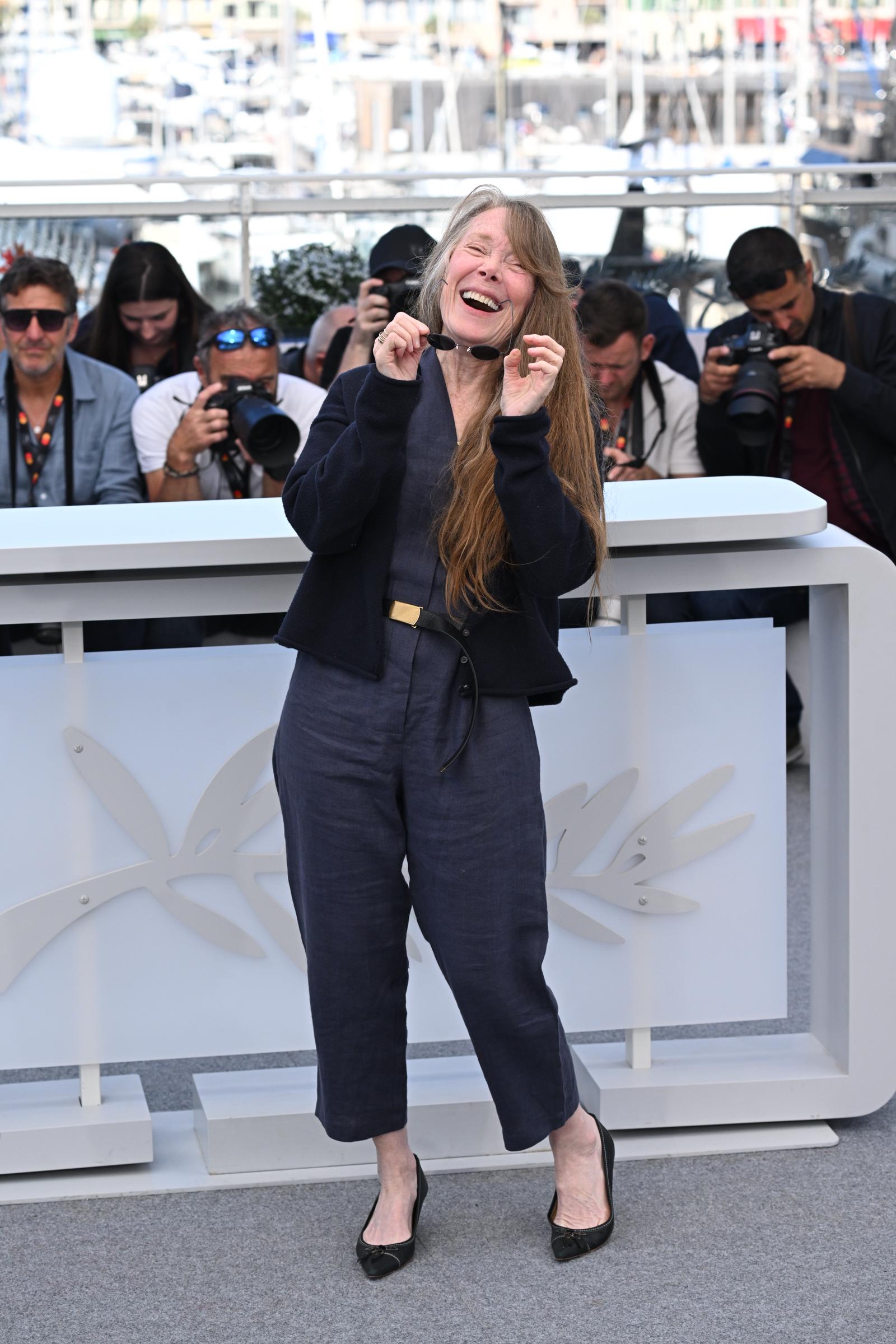 Sissy Spacek laughing while posing for pictures at the "Die, My Love" photocall. | Source: Getty Images