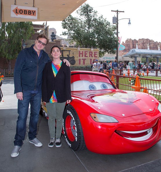 Bob Saget and Jennifer Belle Saget at Disney California Adventure Park in Anaheim, California on March 19, 2016. | Photo: Getty Images