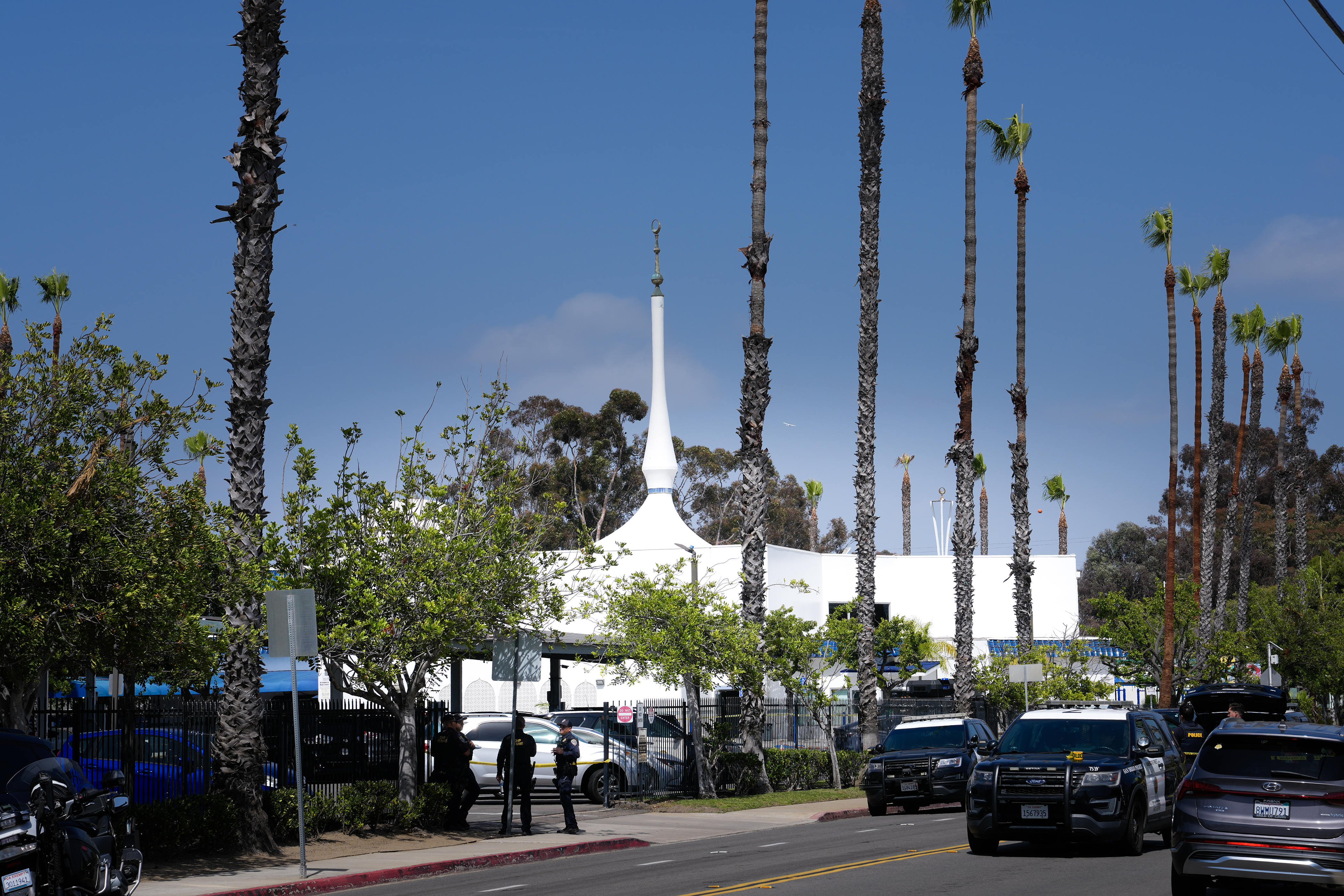 Police vehicles remain outside the Islamic Center of San Diego after the shooting on May 18, 2026 | Source: Getty Images