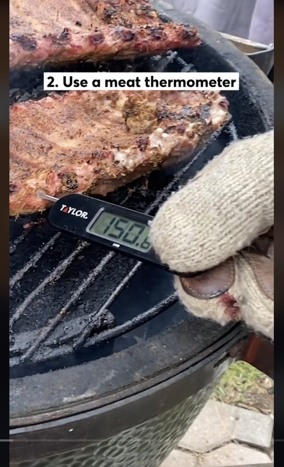 A person holding a meat thermometer to check the temperature of meat, as seen in a video dated September 22, 2023 | Source: TikTok/@consumerreports