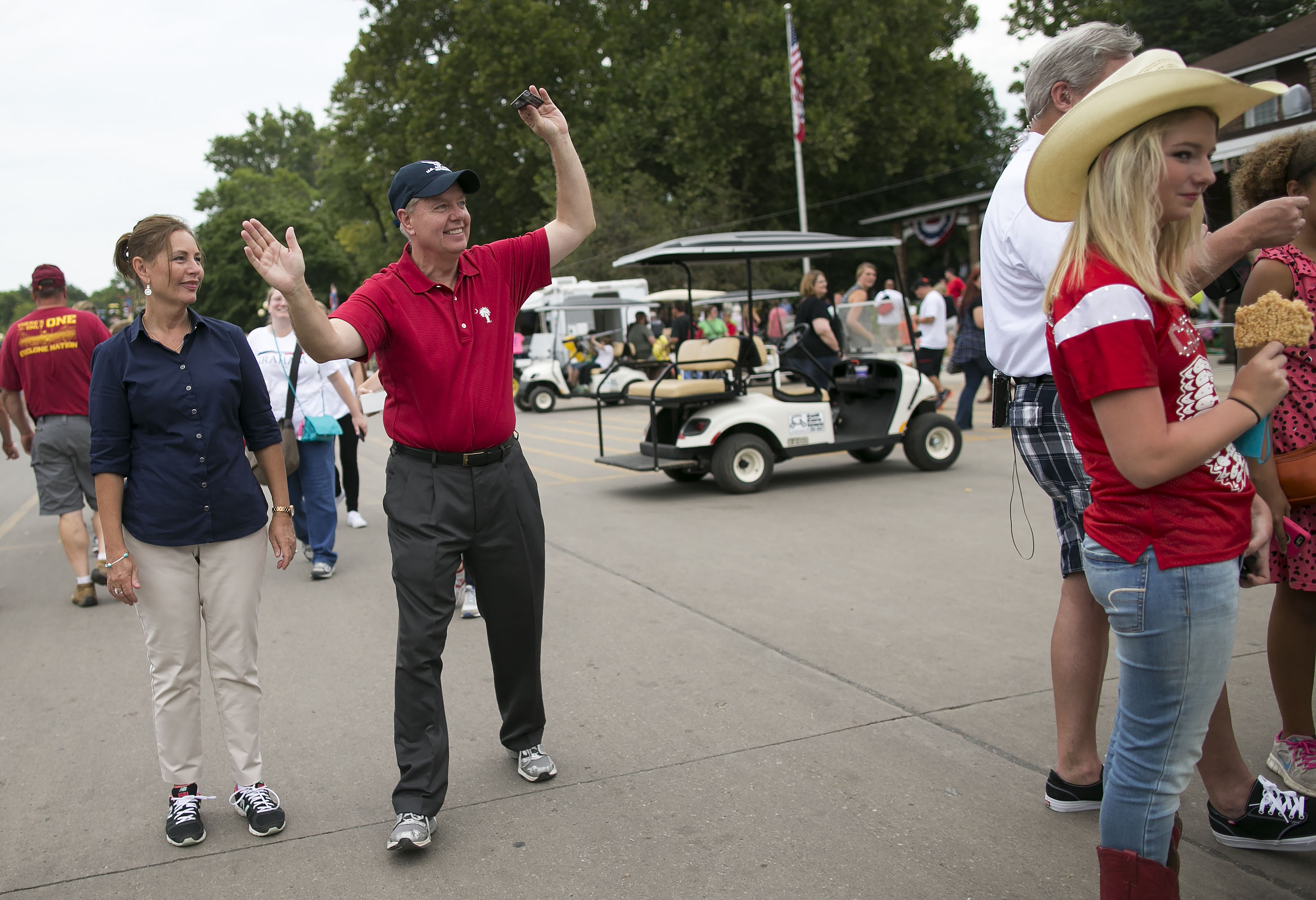 Lindsey Graham campaigns with his sister, Darline Graham Nordone, during the 2015 Iowa State Fair. Years later, Nordone said she would continue her brother's work after being appointed to complete his Senate term.