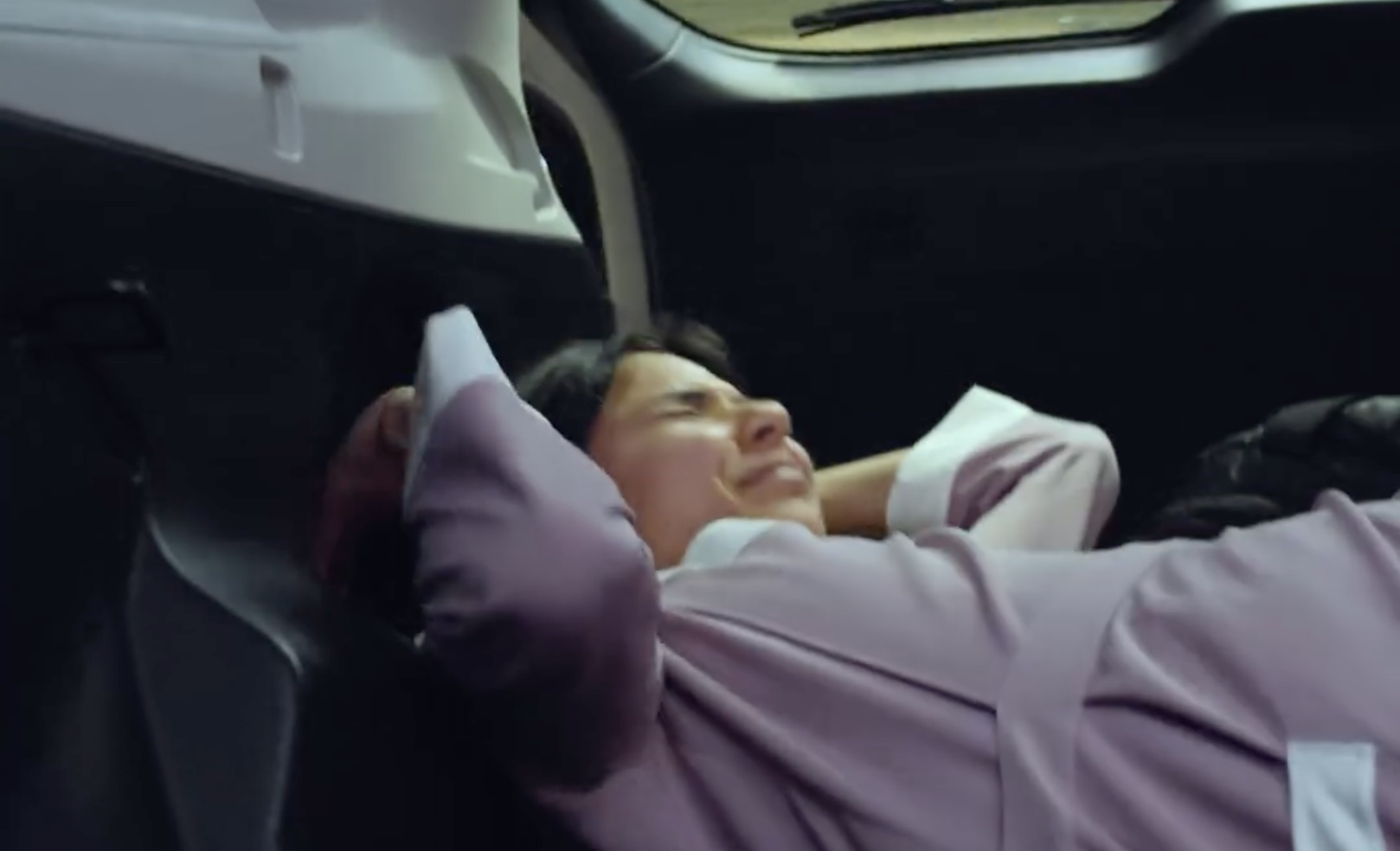 Girl hiding in a car trunk | Source: YouTube/DramatizeMe
