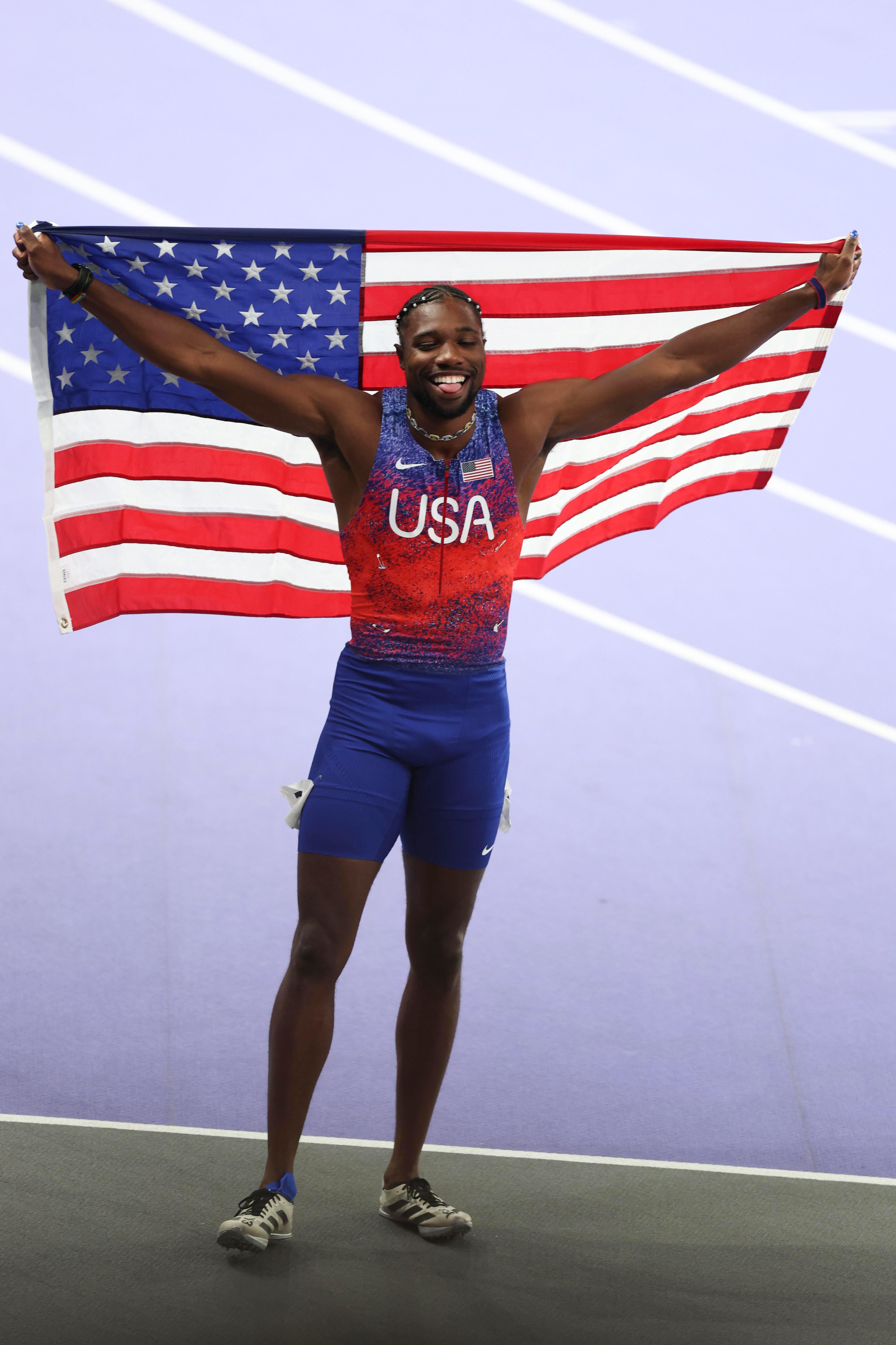 Noah Lyles of Team United States America celebrates after winning the Athletics - Men's 100m Final on day 9 of the Olympic Games Paris 2024 at Stade de France on August 4, 2024 in Saint-Denis, France | Source: Getty Images