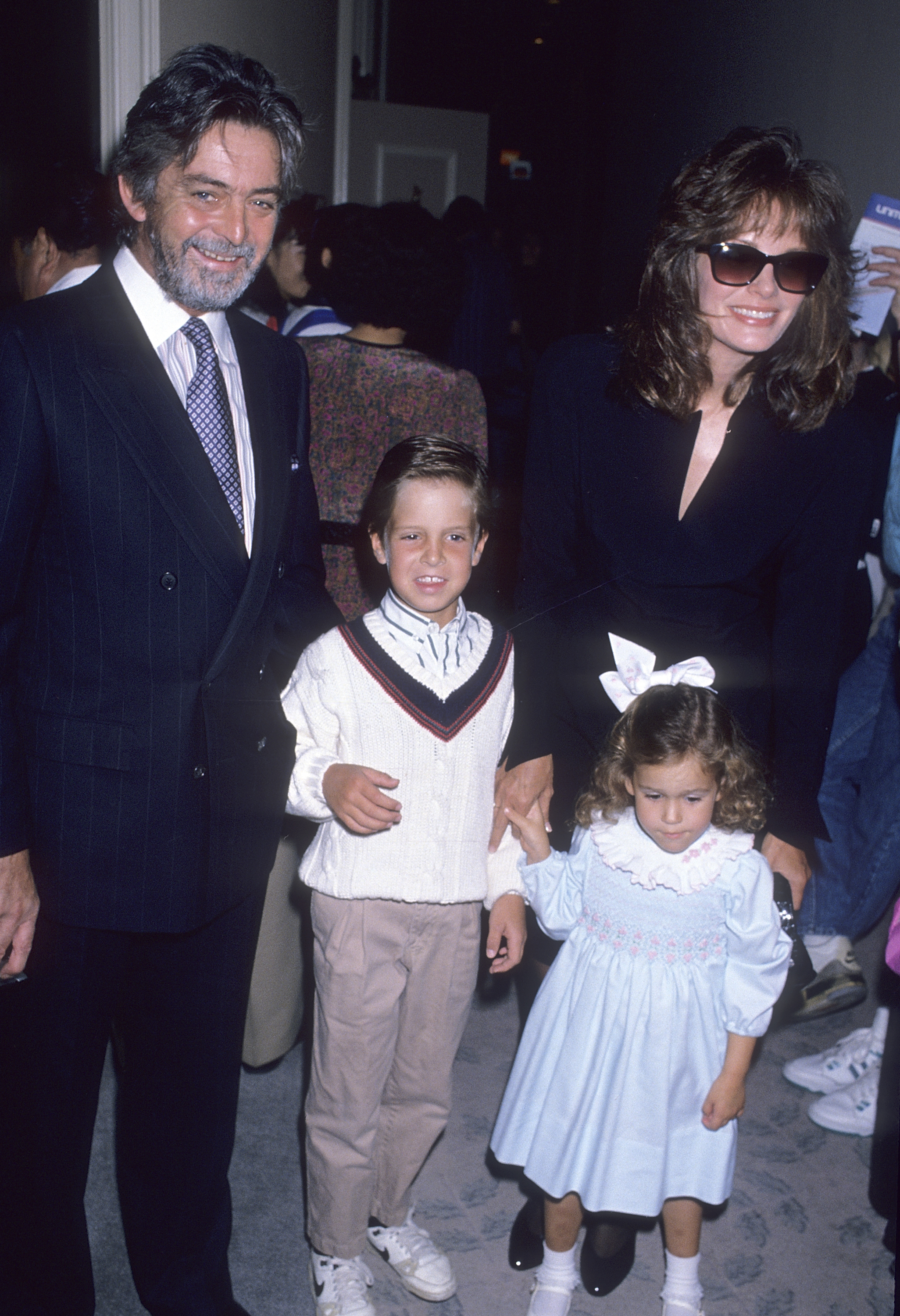 Jaclyn Smith, husband Anthony Richmond and kids Spencer and Gaston on October 15, 1989 at the Beverly Hilton Hotel in Beverly Hills, California | Source: Getty Images