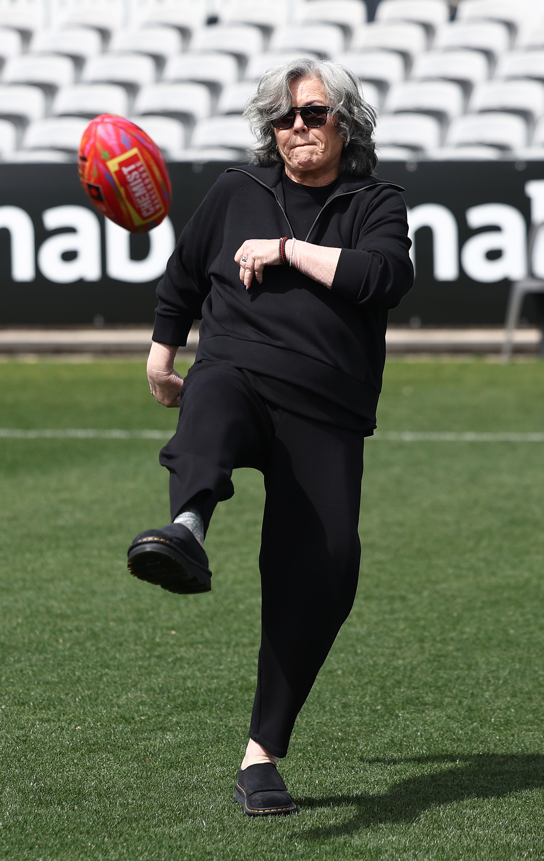 Rosie O'Donnell kicks the football during the AFLW Pride Round Media Opportunity at Ikon Park on October 13, 2025 | Source: Getty Images