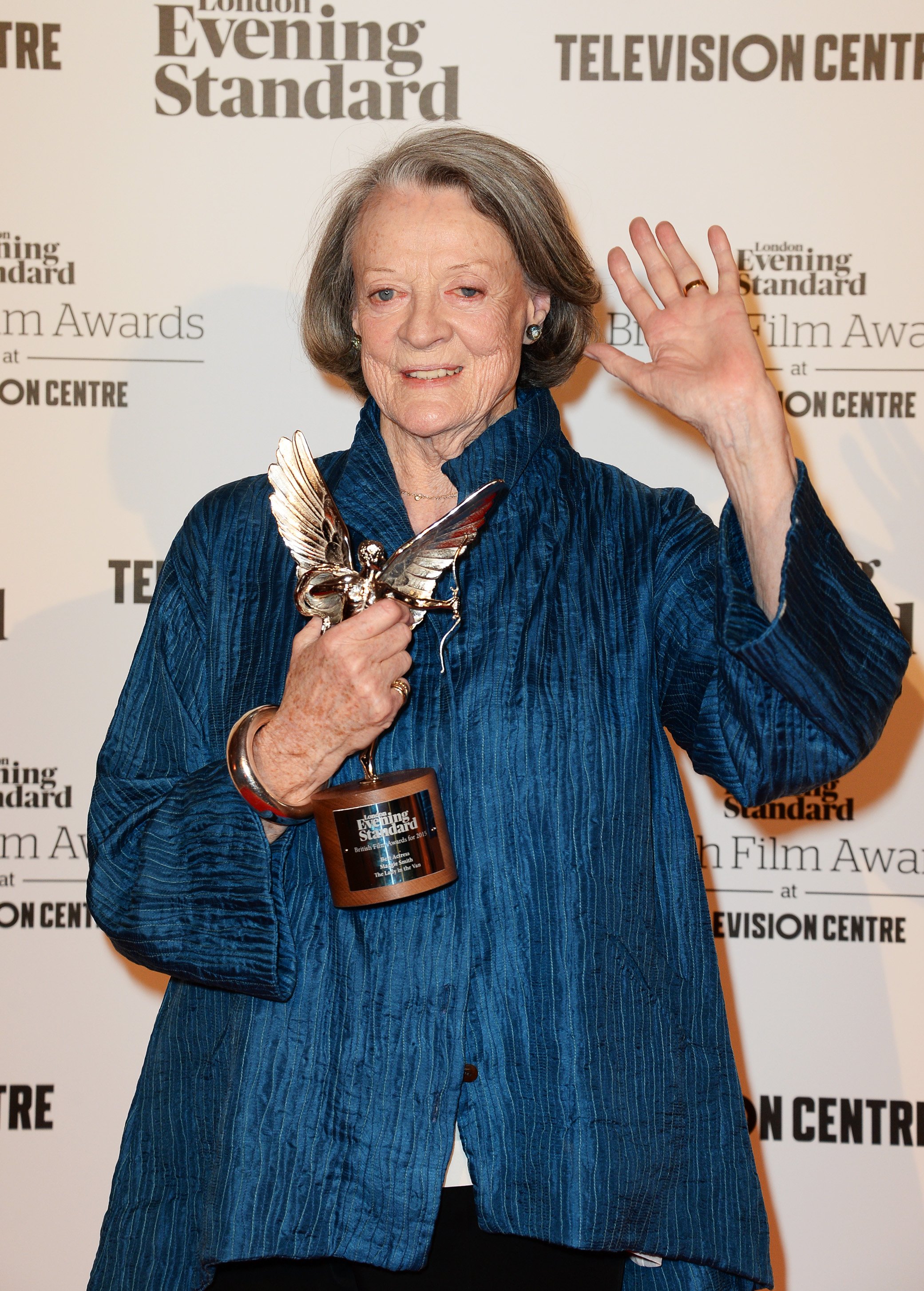 Dame Maggie Smith, winner of the Best Actress award for "The Lady in the Van" at the London Evening Standard British Film Awards at Television Centre on February 7, 2016 in London, England. | Source: Getty Images