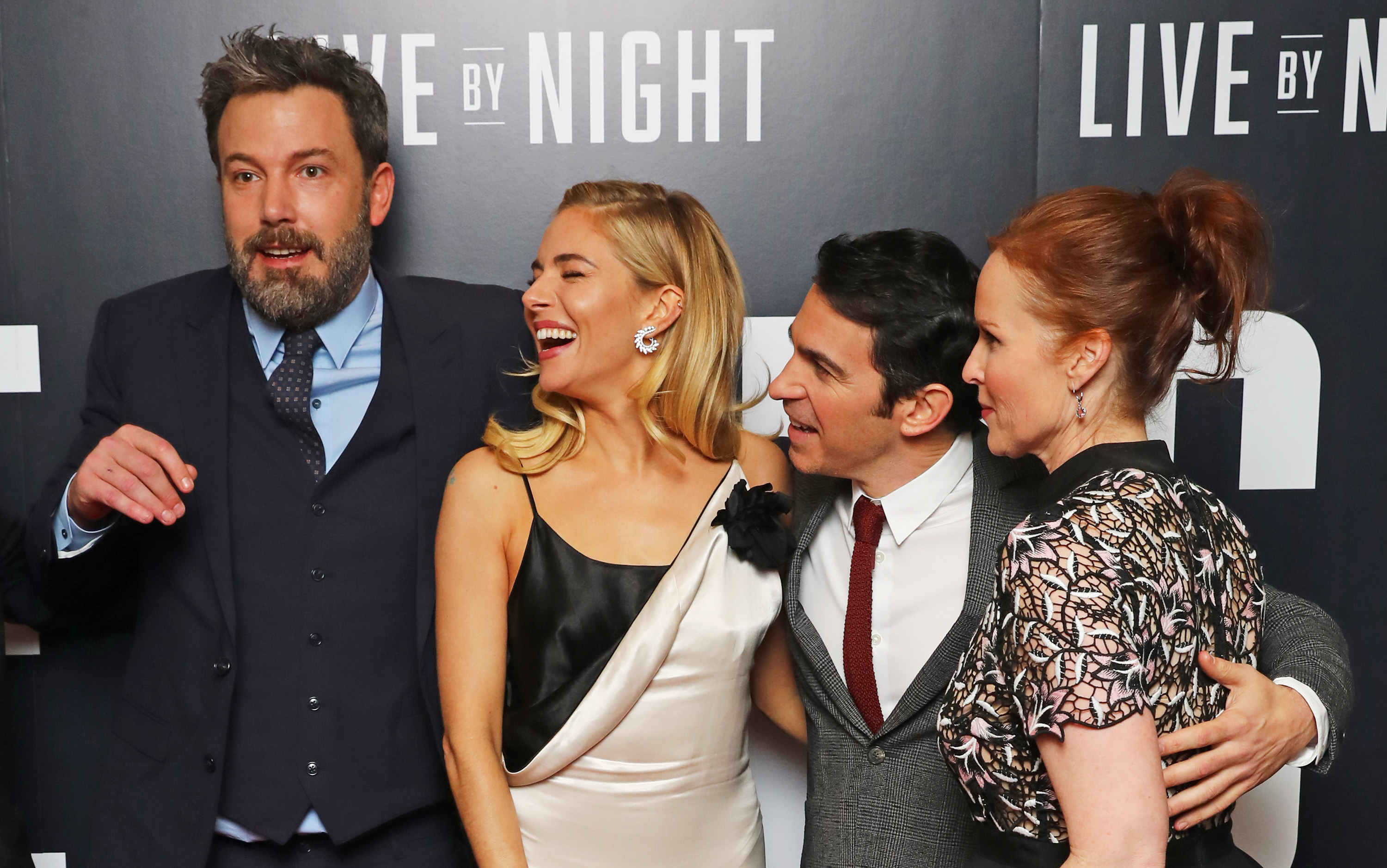 (L to R) Ben Affleck, Sienna Miller, Chris Messina and Jennifer Todd attend the European premiere of "Live By Night" at BFI Southbank, on January 11, 2017, in London, United Kingdom. | Source: Getty Images