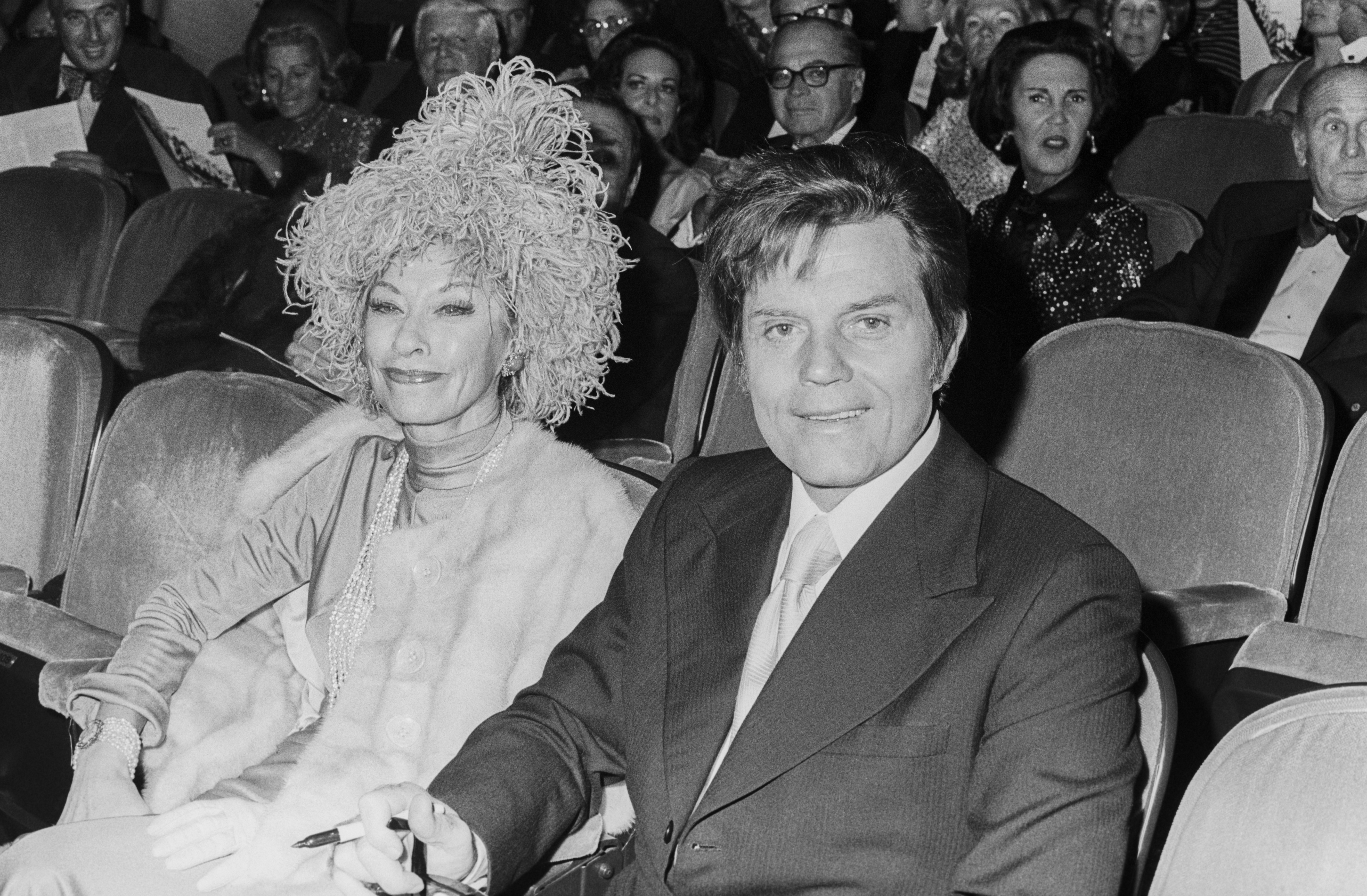 Jack Lord with his wife Marie De Narde seated in a New York theater; circa 1970. | Source: Getty Images
