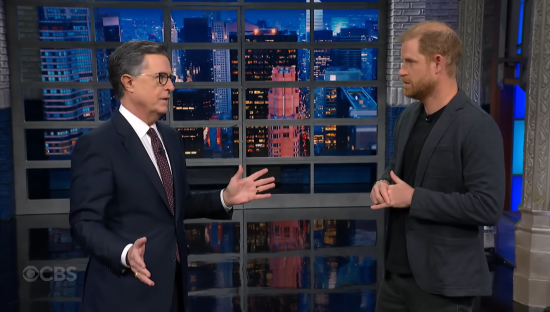 Stephen Colbert and Prince Harry face each other onstage as the bit continues, as posted on December 4, 2025 | Source: YouTube/ColbertLateShow