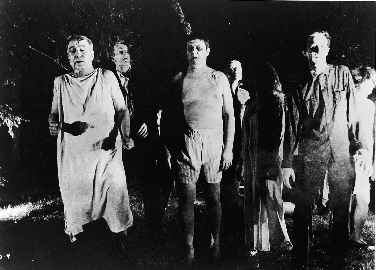 Still from "Night of the Living Dead" 1968 | Source: Wikimedia Commons/ Direction and cinematography both by George A. Romero, Zombies NightoftheLivingDead, marked as public domain