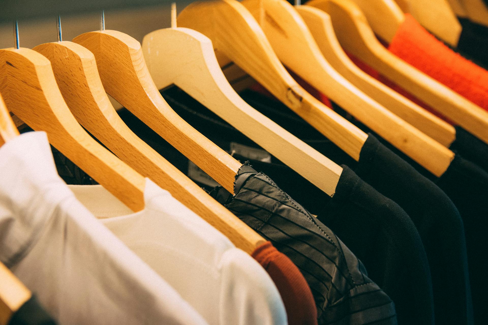 Clothes hanging in a closet | Source: Pexels