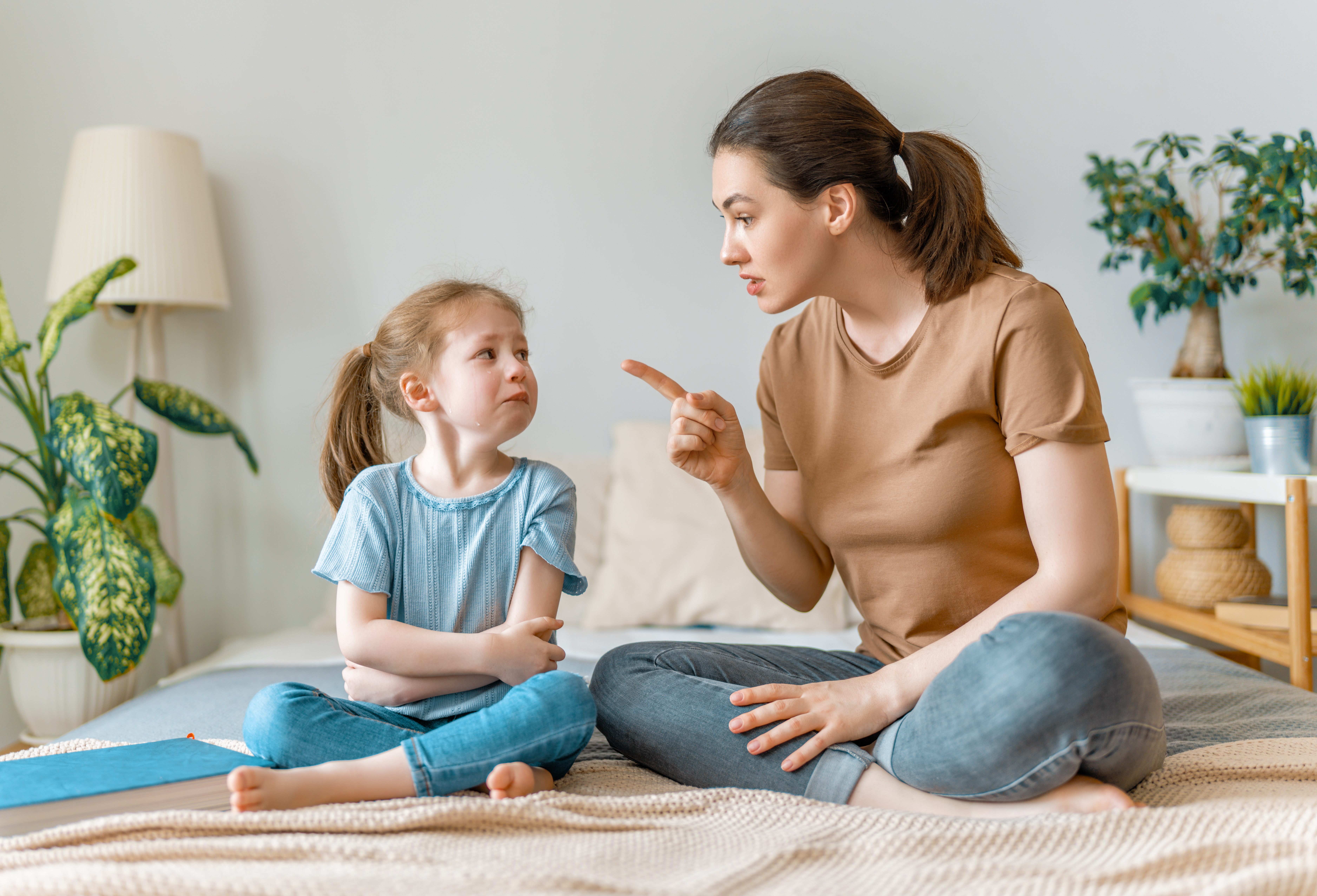 A mother disciplining her child | Source: Shutterstock