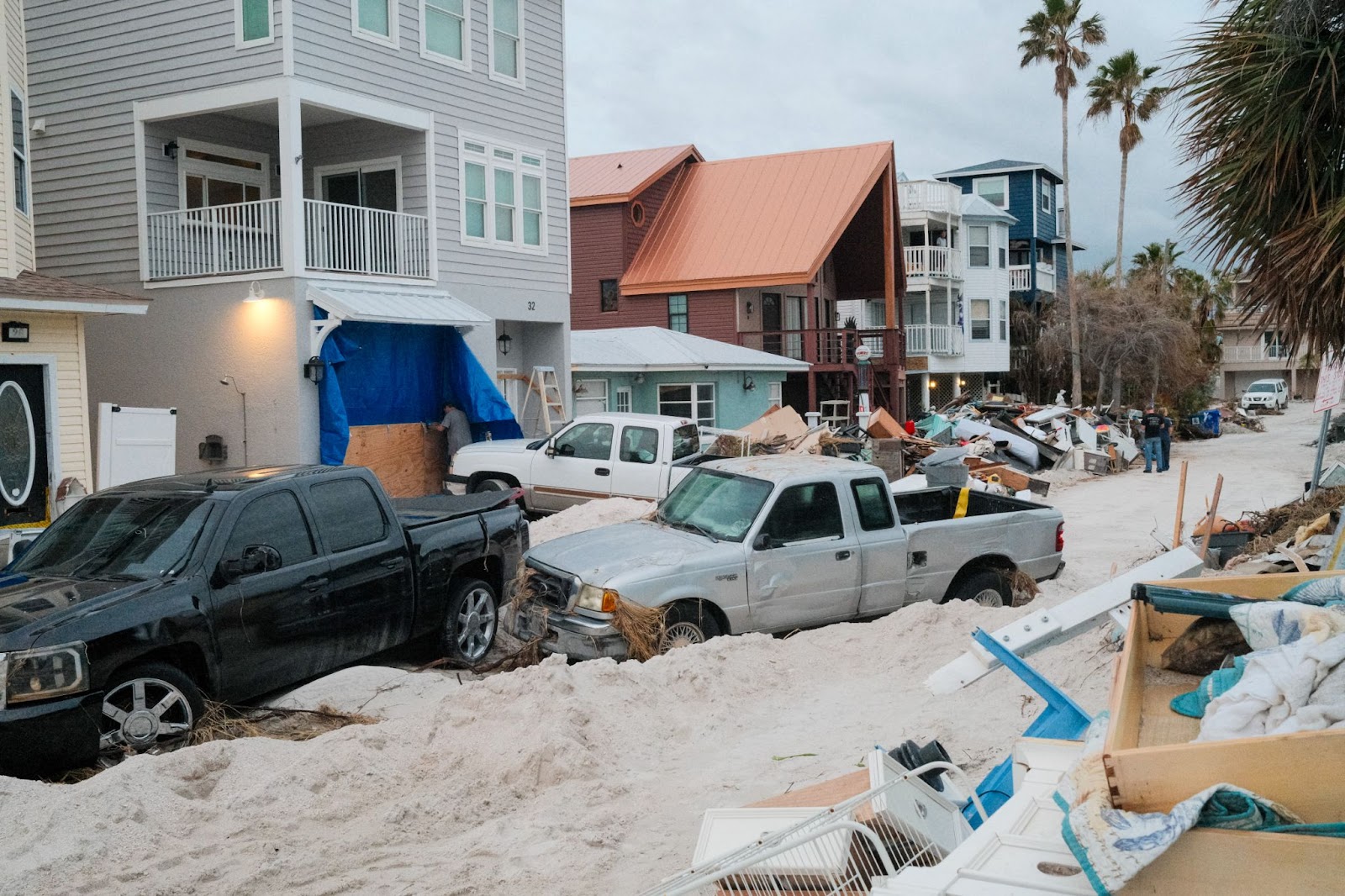 Vehicles and debris left by Hurricane Helene ahead of Hurricane Milton's expected landfall in Treasure Island, Florida. | Source: Getty Images