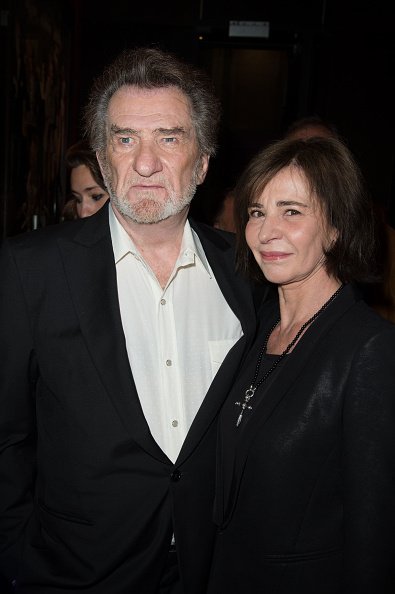 Eddy Mitchell et Muriel Moine assistent à la "Salaud On T'Aime" : After Party. |Photo : Getty Images