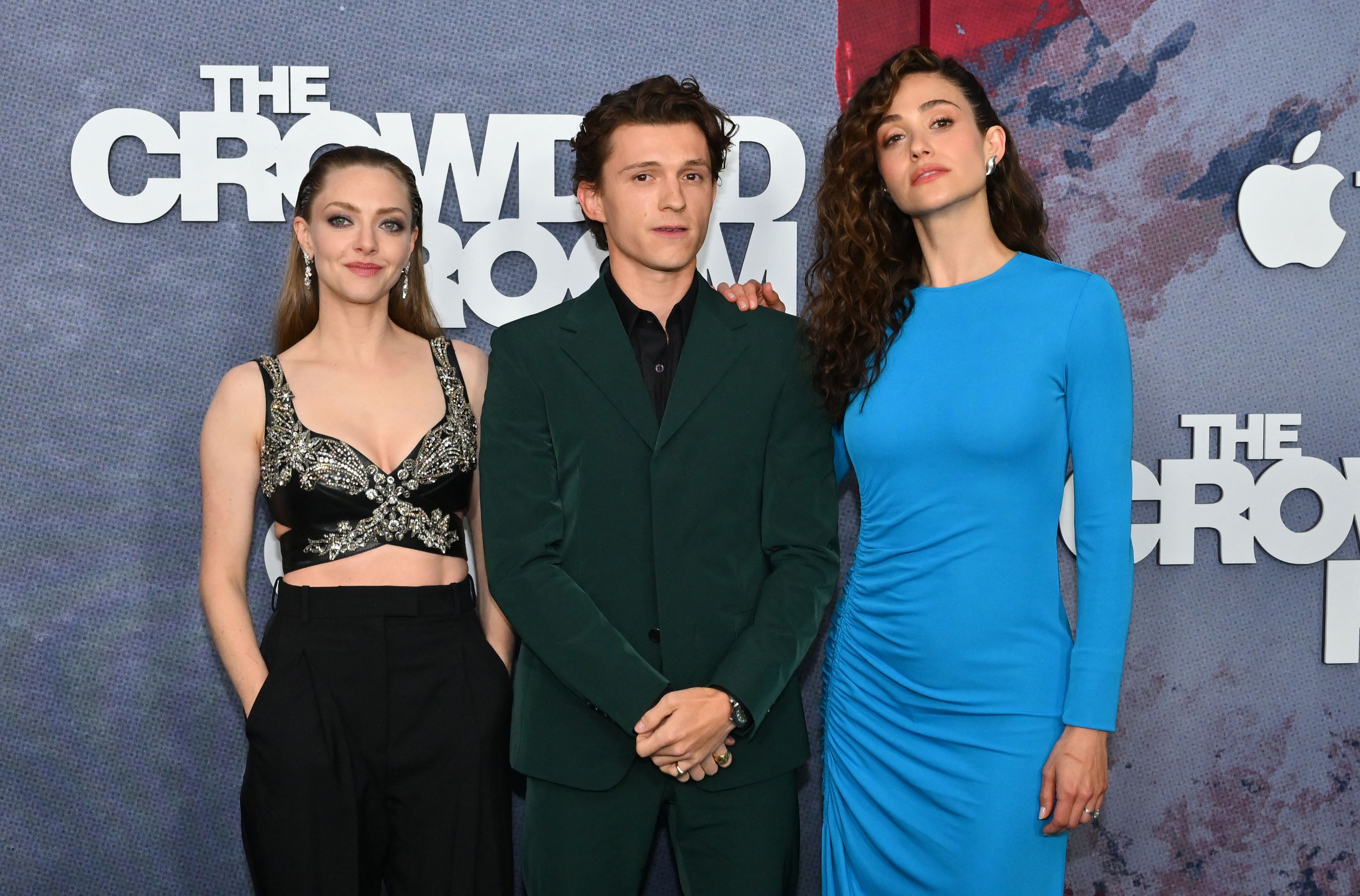Amanda Seyfried, Tom Holland, and Emmy Rossum attend the premiere of Apple TV+'s "The Crowded Room" at the Museum of Modern Art on June 1, 2023, in New York City. | Source: Getty Images